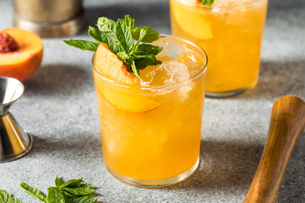 Boozy Refreshing Peach Bourbon Smash Cocktail by Brent Hofacker on 500px.com