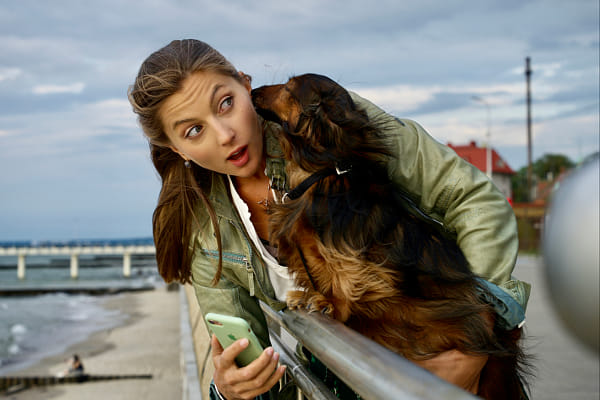 Portrait of young woman standing by railing against sky by zazznobe on 500px.com