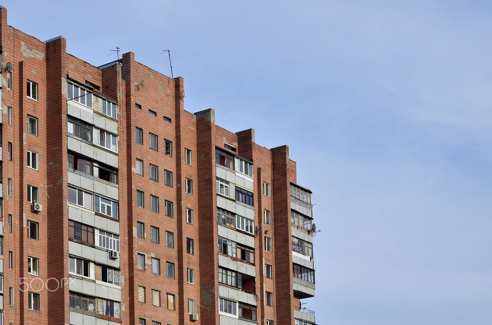 Old multi-storey apartment house in a poorly-developed region of Ukraine or Russia
