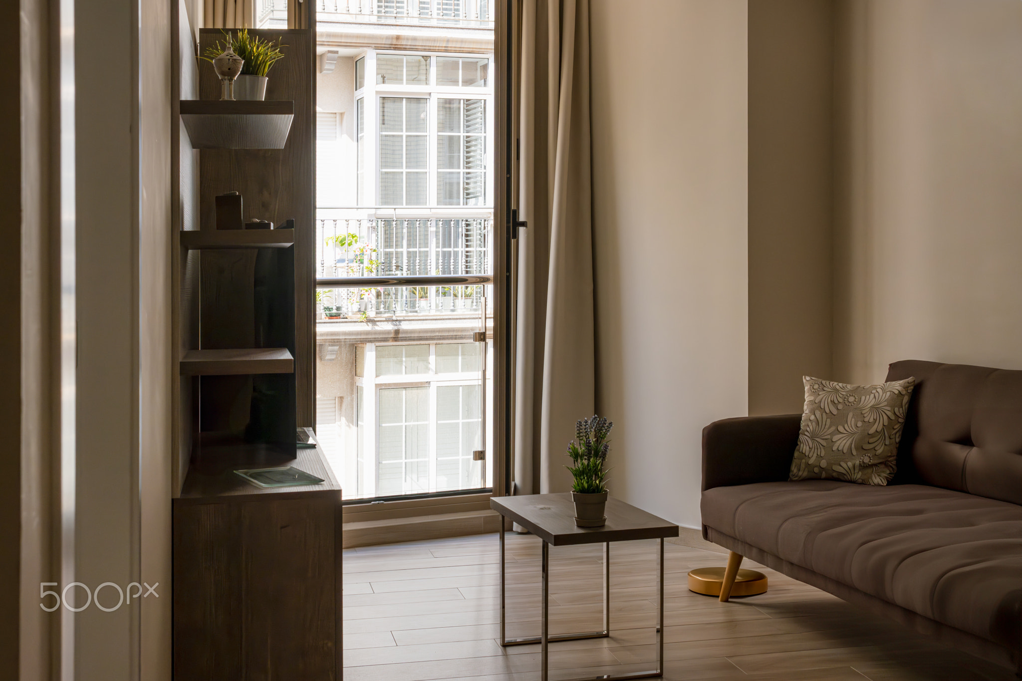 Interior design of a cozy living room with a stylish sofa, coffee