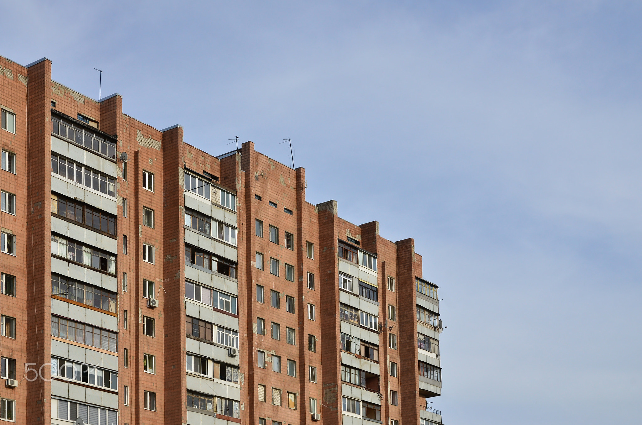 Old multi-storey apartment house in a poorly-developed region of Ukraine or Russia