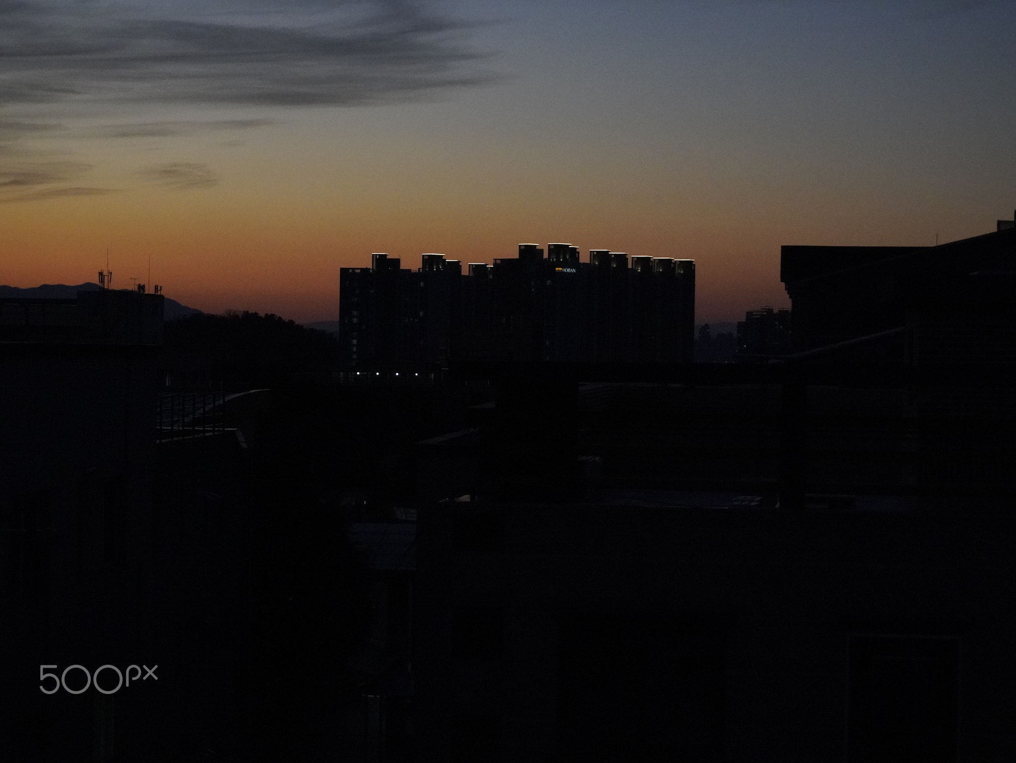 Shadows of buildings at sunset