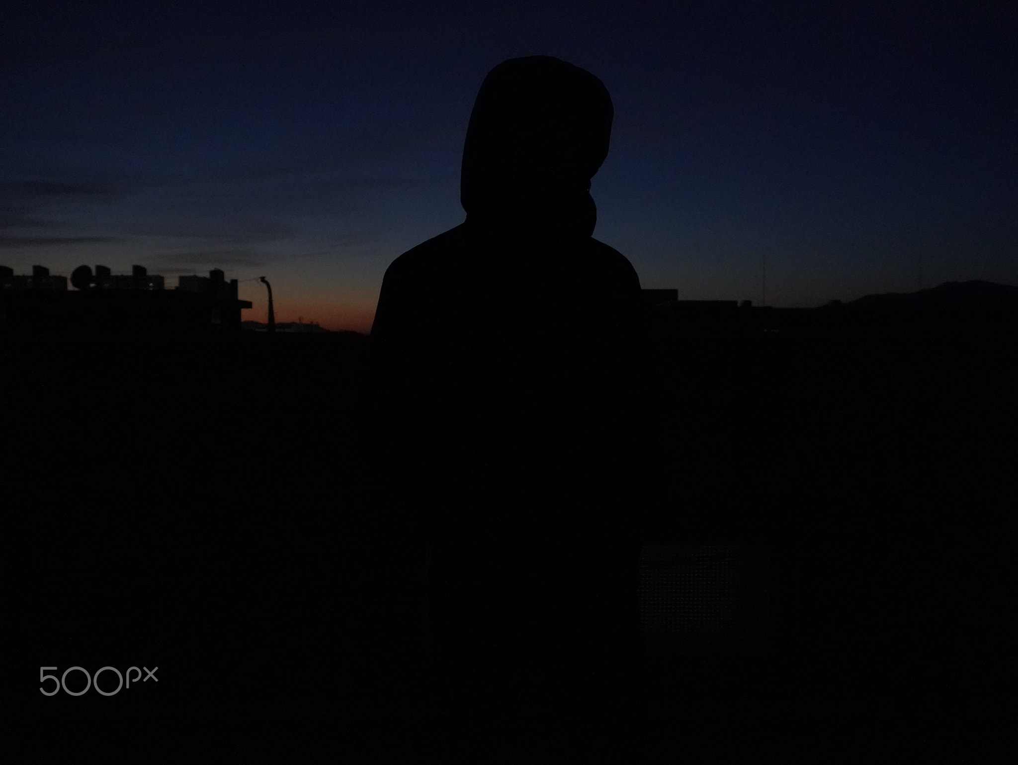 Shadow of a man at sunset