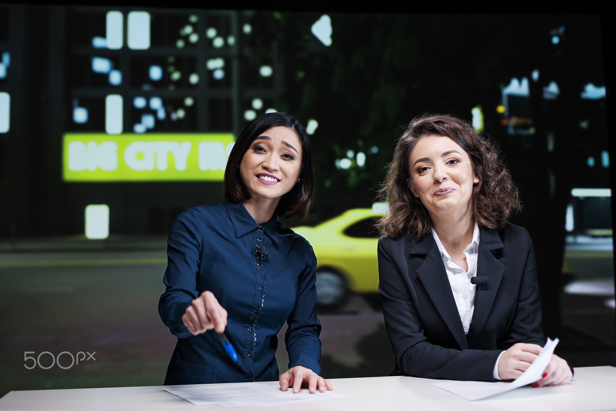 Newscasters team hosting night show