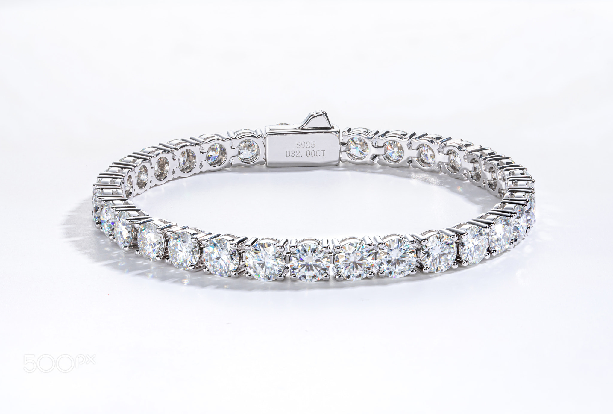 Jewelry Ballet: The Allure of Multiple Diamond Bracelets in a Black and White Interplay