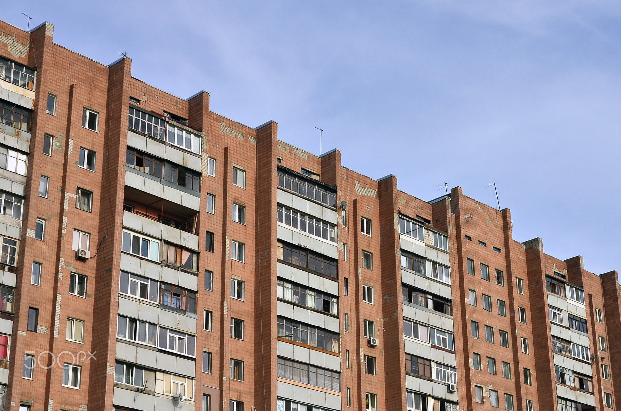 Old multi-storey apartment house in a poorly-developed region of Ukraine or Russia