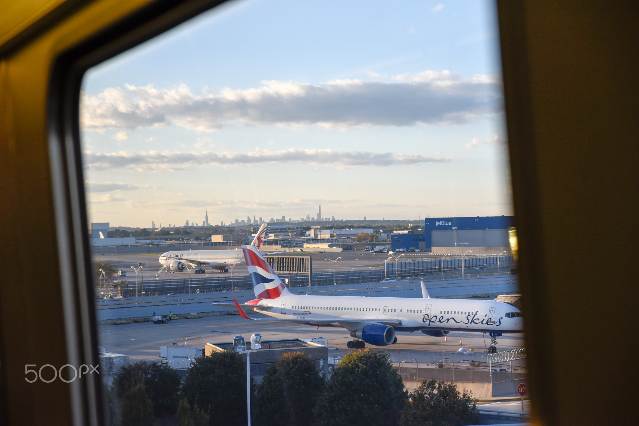 New York, NY, USA Aerial view of JFK airport terminal, tower and apron with Delta airlines