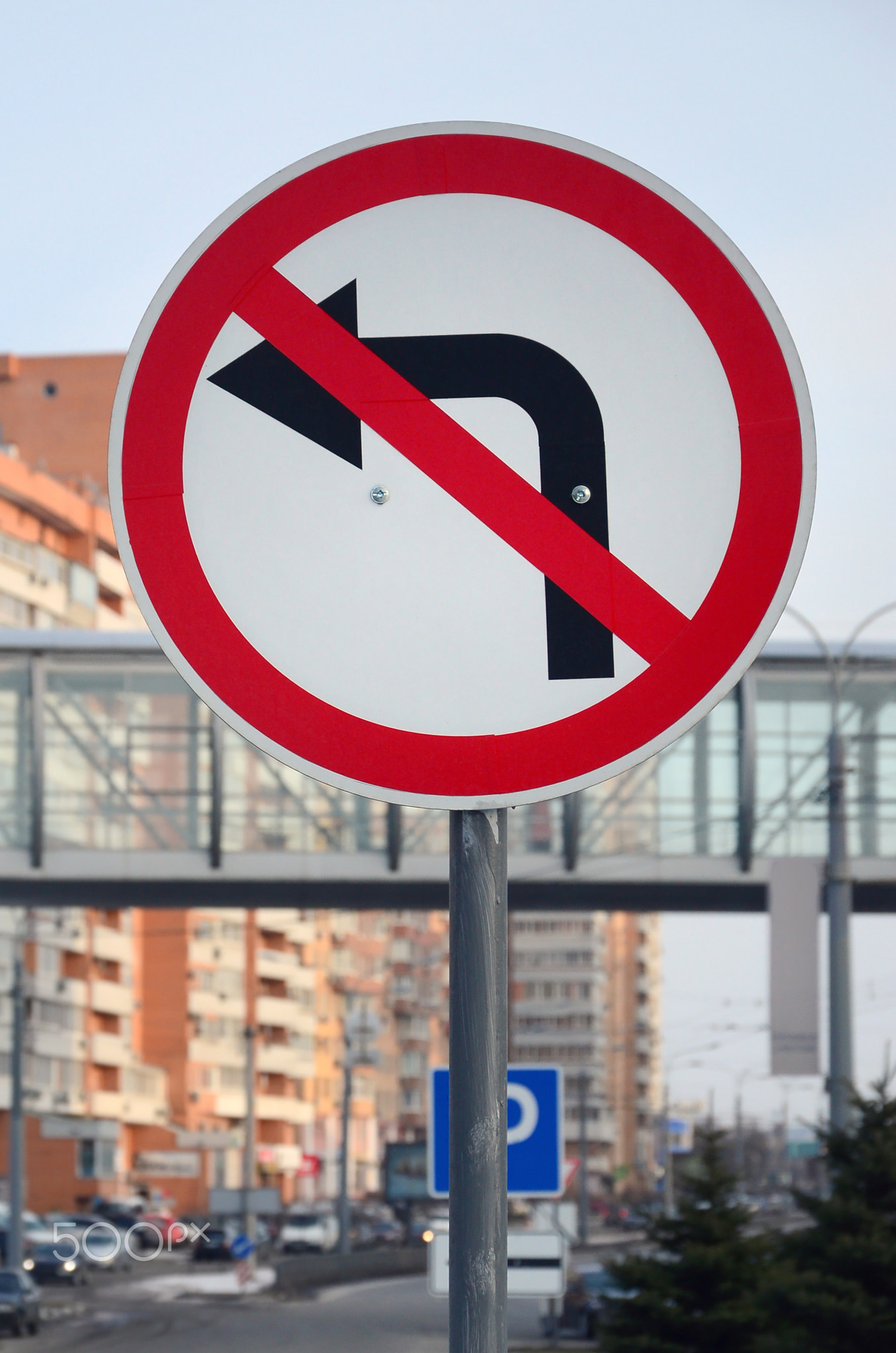 Turn left is prohibited. Traffic sign with crossed out arrow to the left