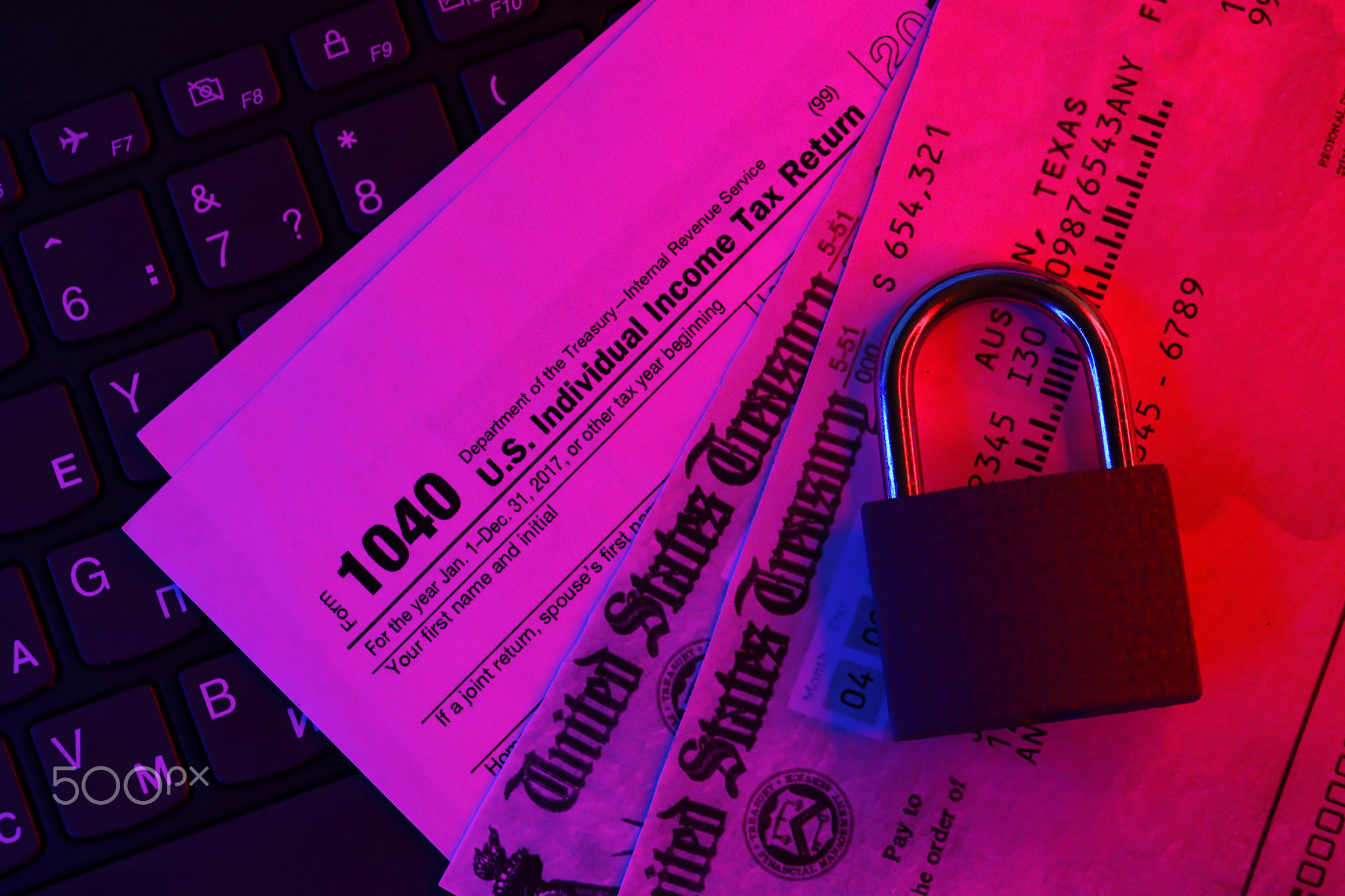 1040 US Individual Income Tax Return form with small locked padlock. Sanctions or blocked tax