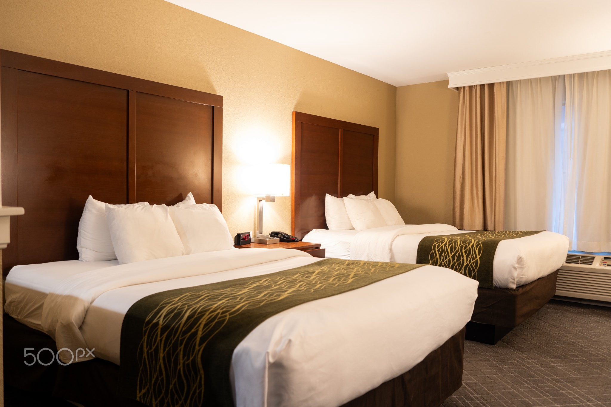 Standard hotel bedroom with two queen size beds