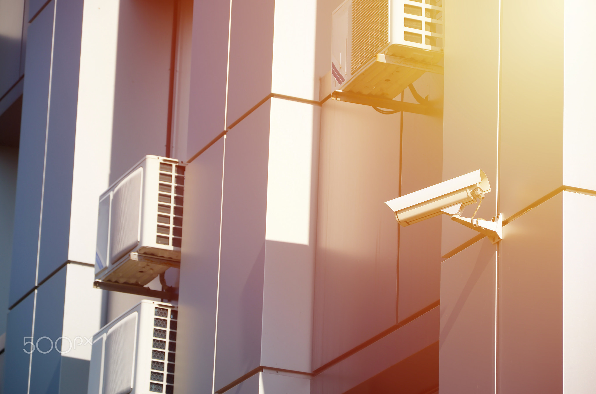 Many HVAC air conditioning and ventilation systems on wall