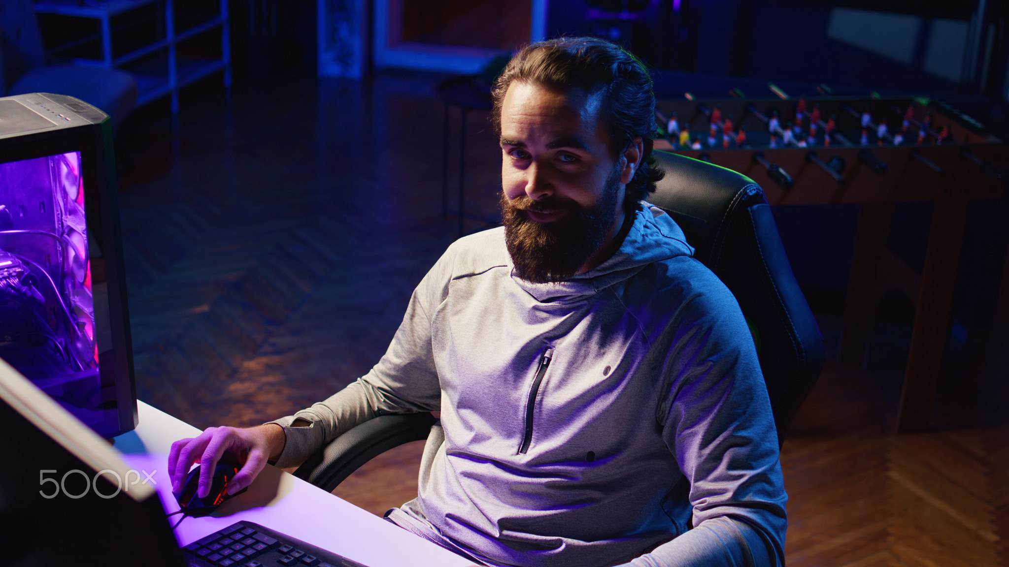 Pro gamer chatting with his community, showing game tactics guide to