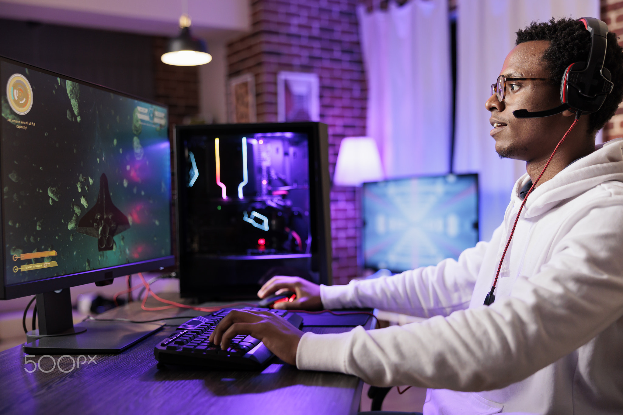 Gamer playing arcade action videogame