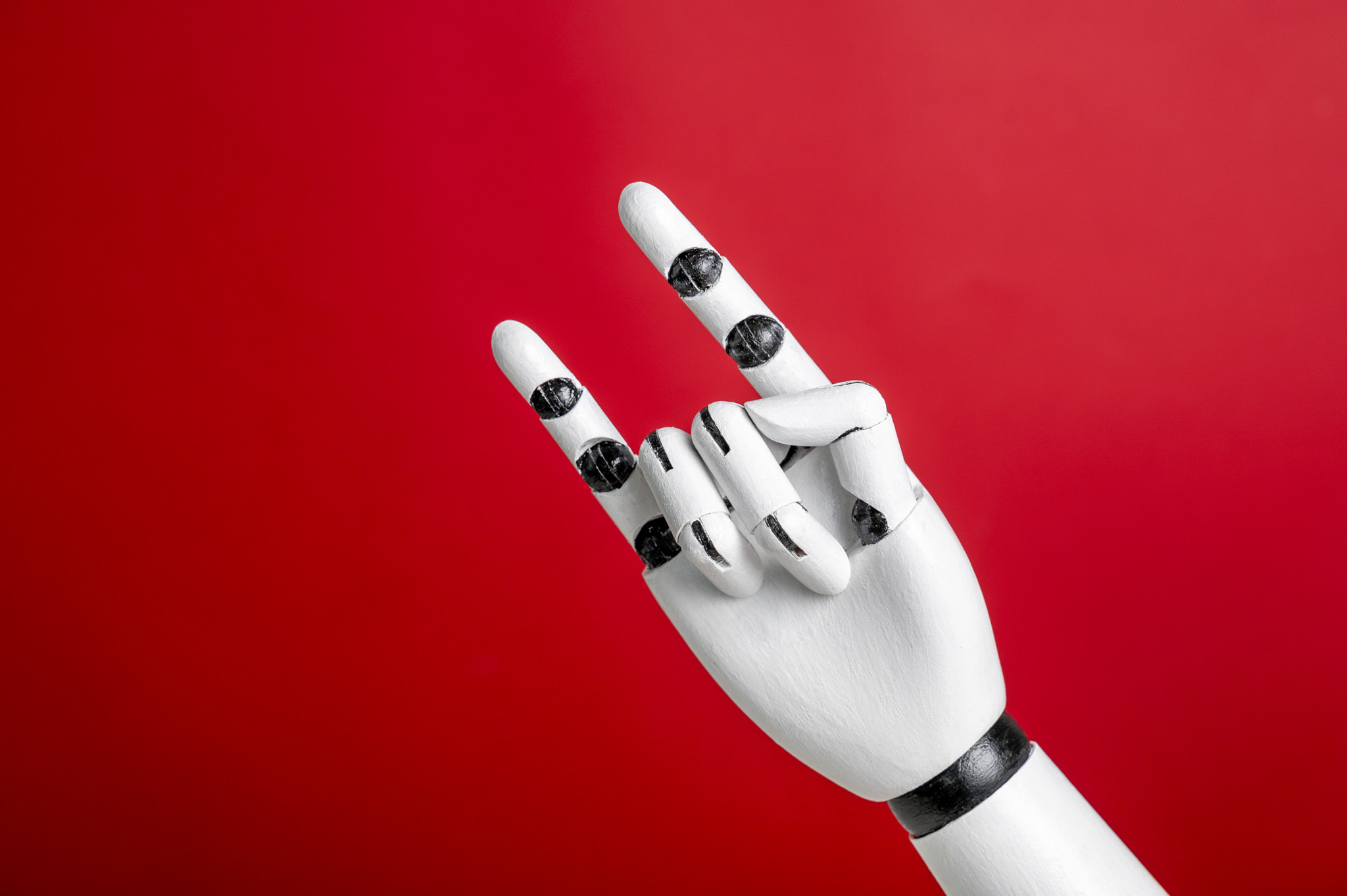 Robot hand gesture horns or rock