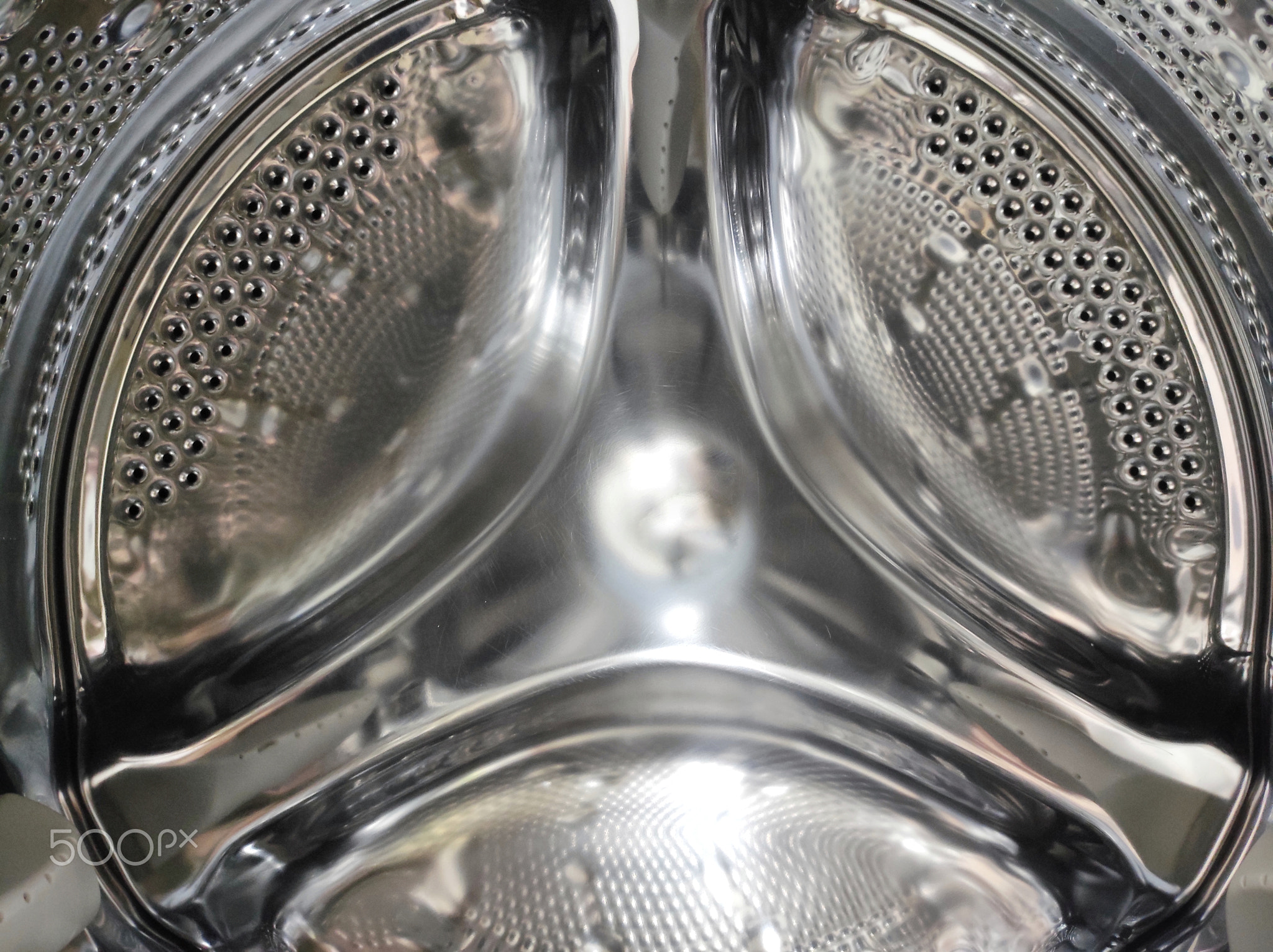 Iron tank in the washing machine. Metal part in a washing machine