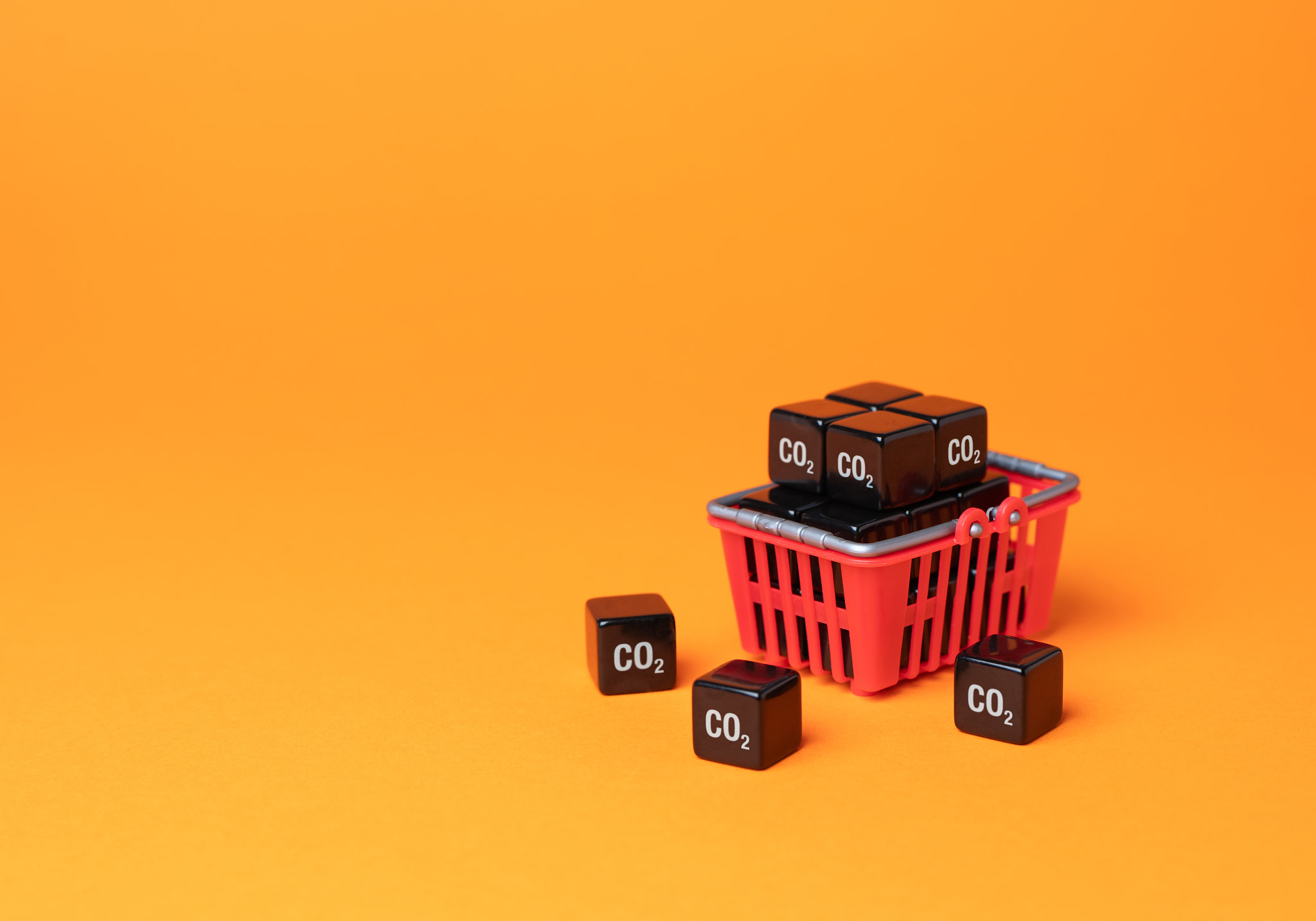 Shopping basket and cubic CO2 carbon dioxide. Greenhouse gas consumption and footprint. Customers ca