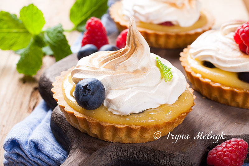 Mini lime curd tartlets with meringue.