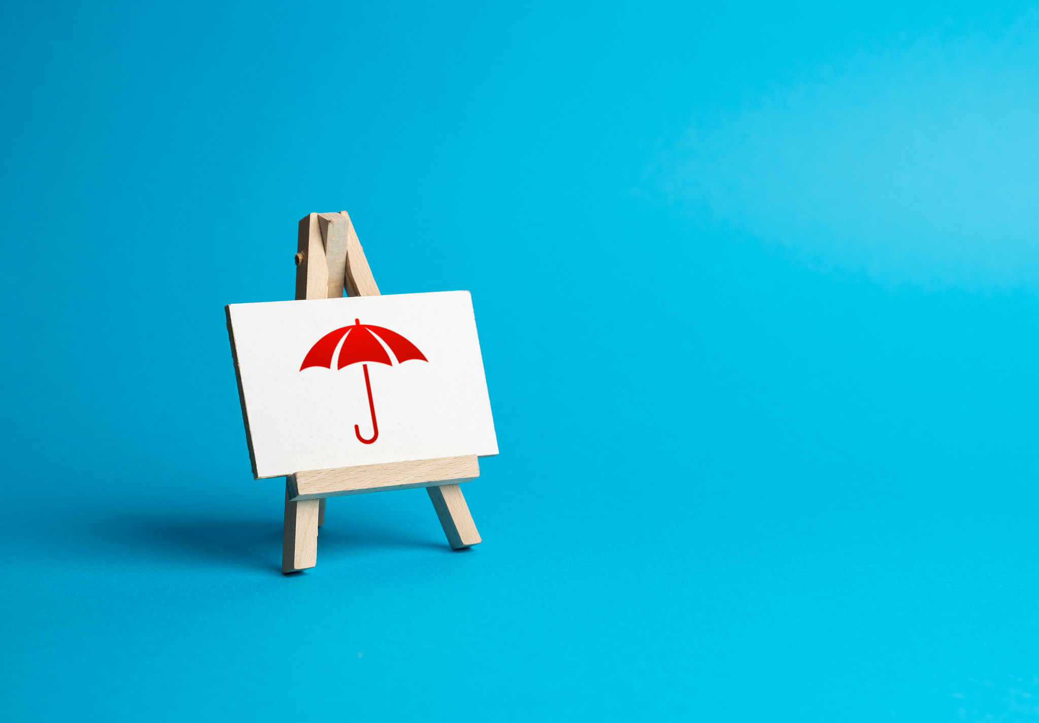 Red umbrella on a sign. Insurance and protection concept. Insurance products services. Coverage for