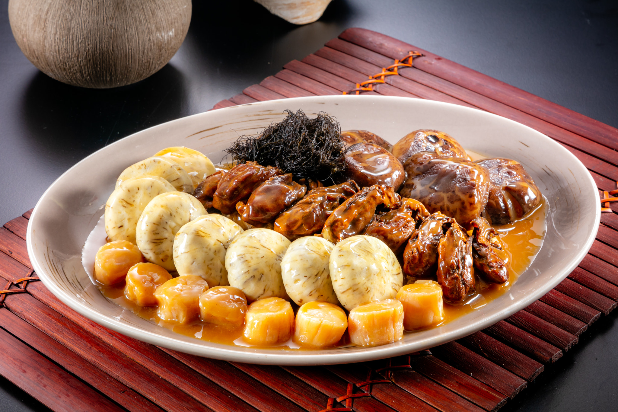 traditional asian luxury treasure premium seafood Peng cai in hot clay pot banquet food menu