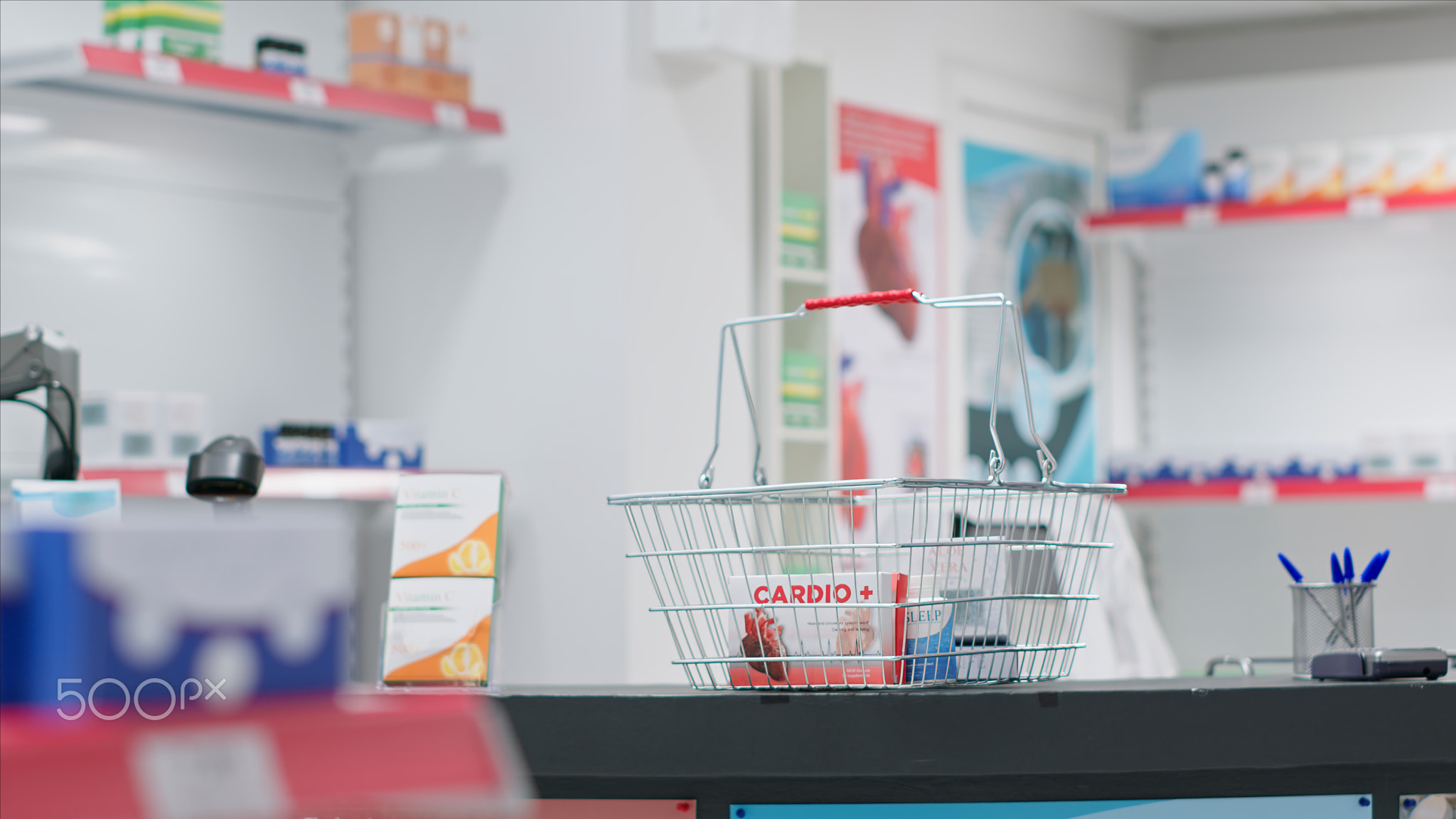 Empty drugstore cash register with boxes of pills or vitamins