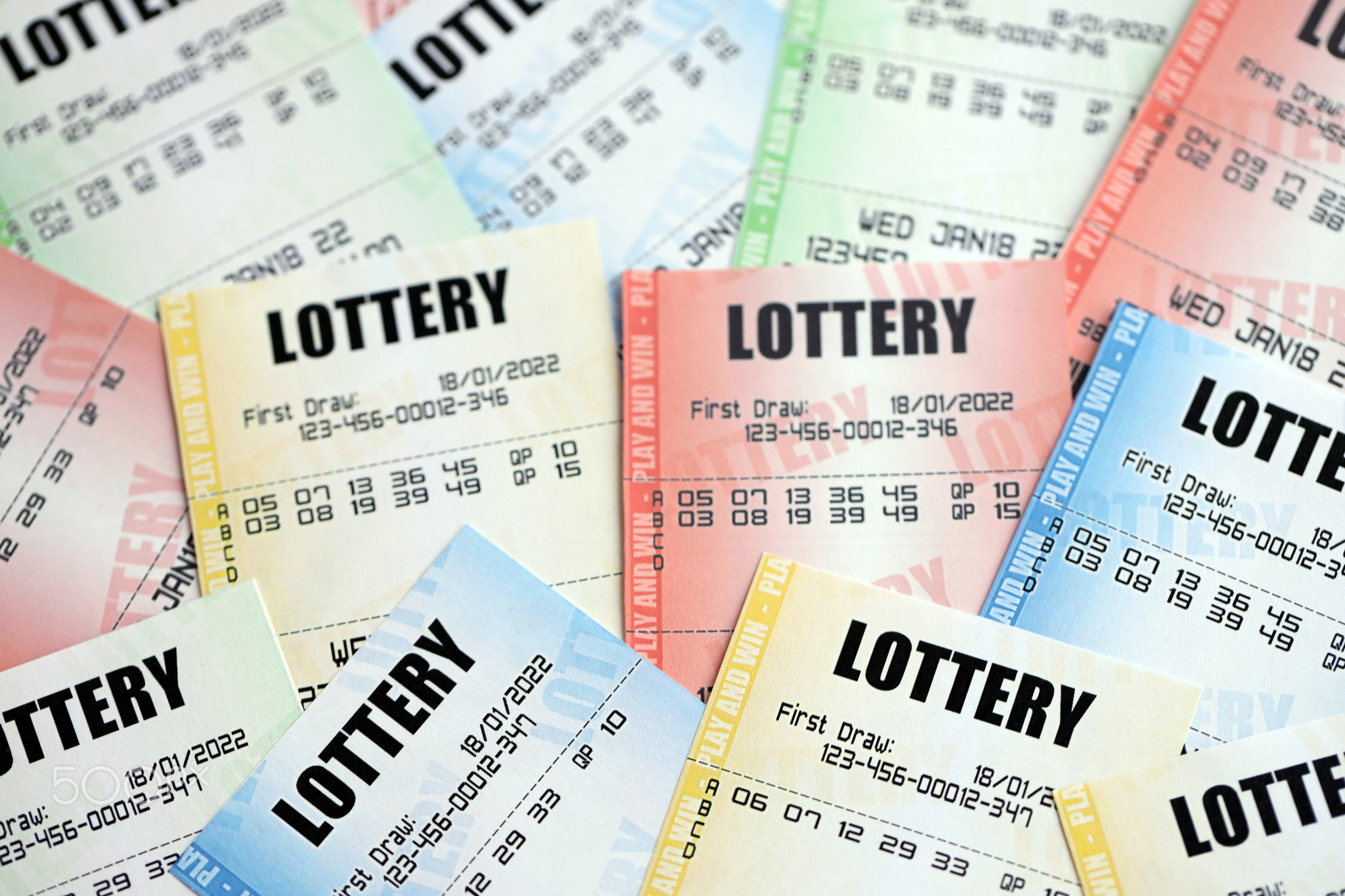 Many lottery tickets on blank bills with numbers for playing lottery