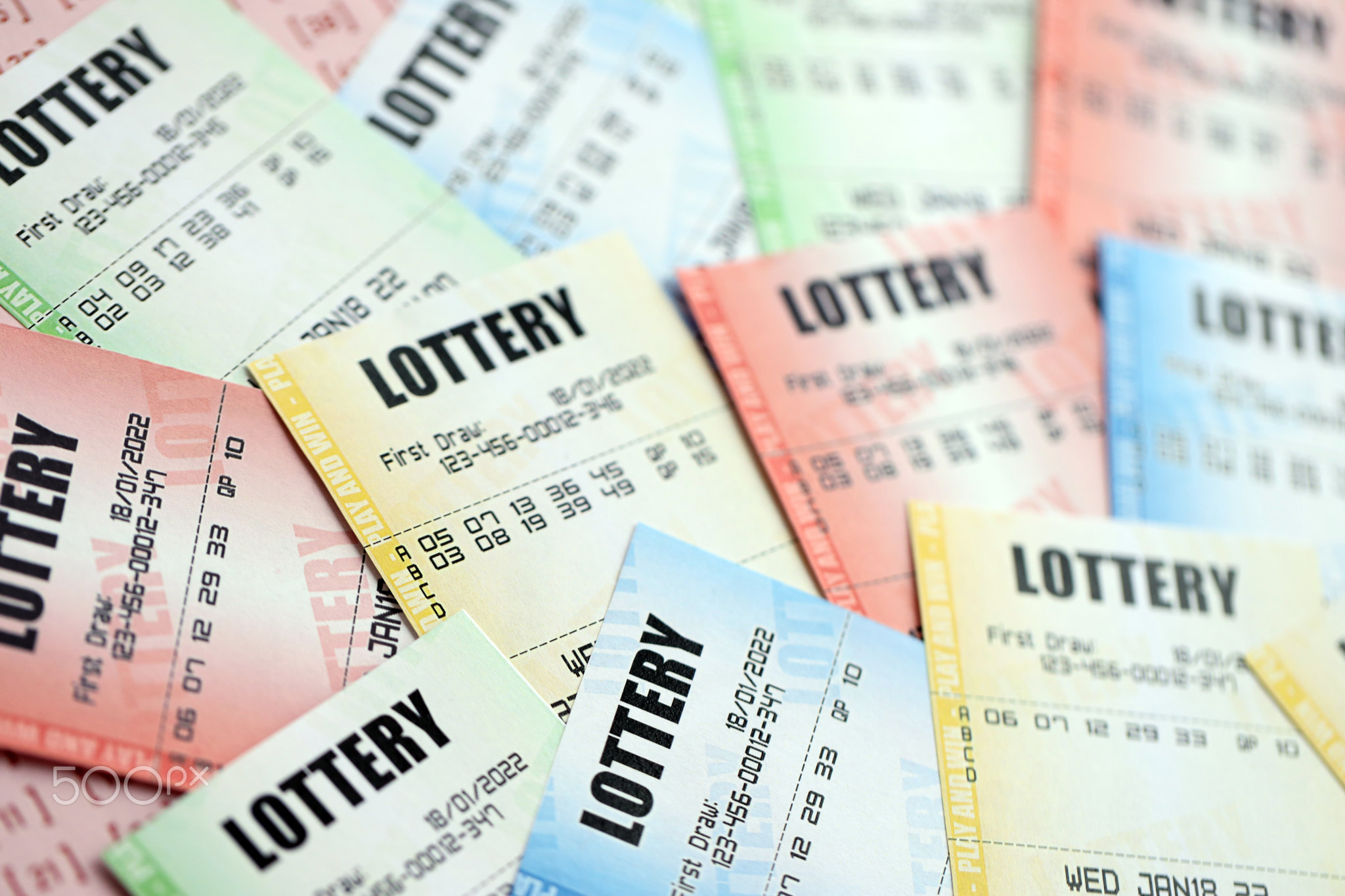 Many lottery tickets on blank bills with numbers for playing lottery