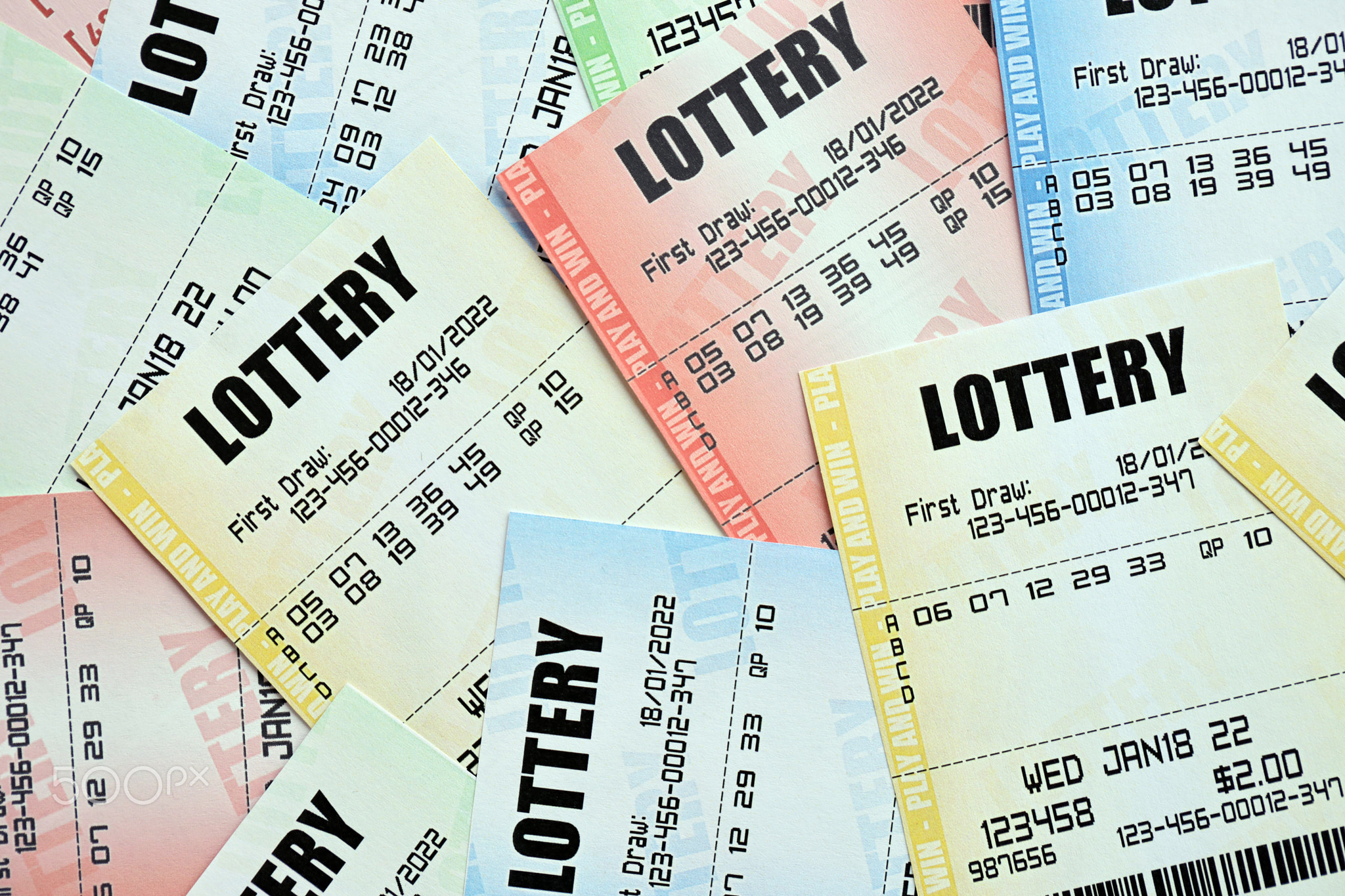 Many lottery tickets on blank bills with numbers for playing lottery