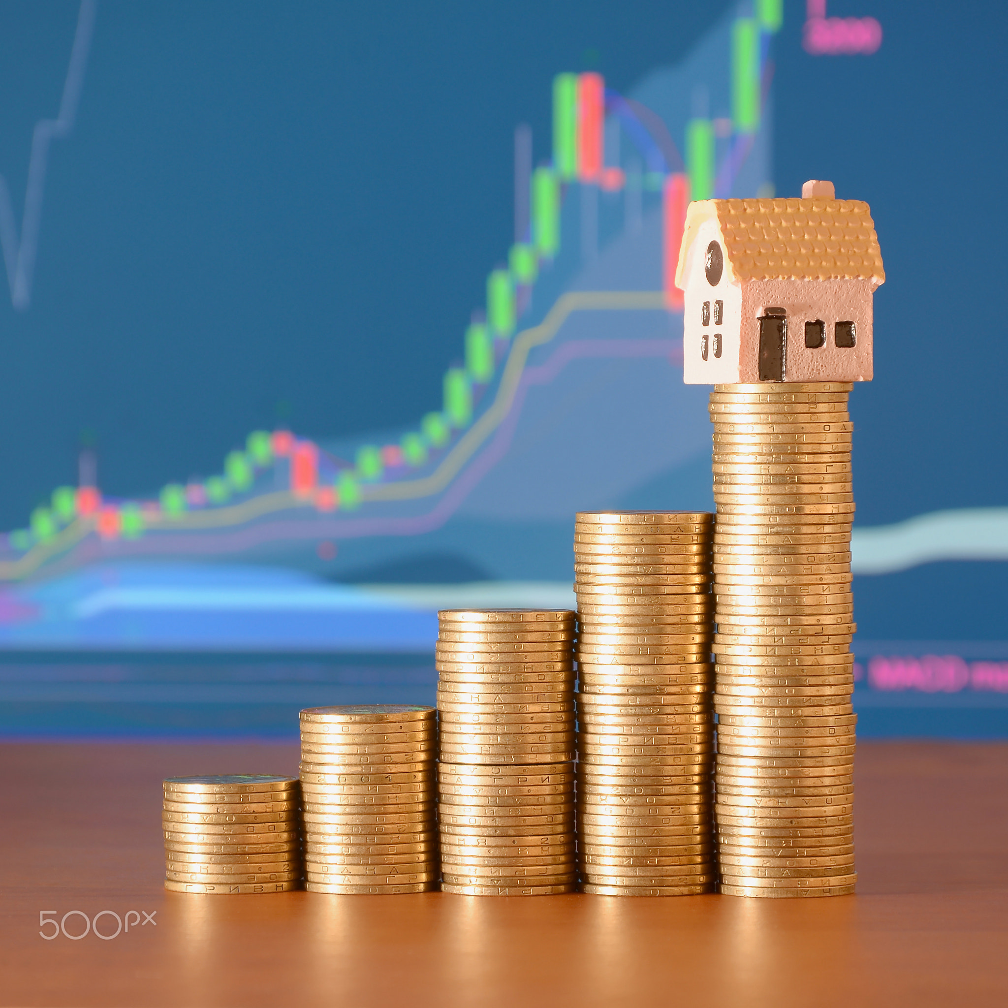 Planning savings money of coins to buy a home concept