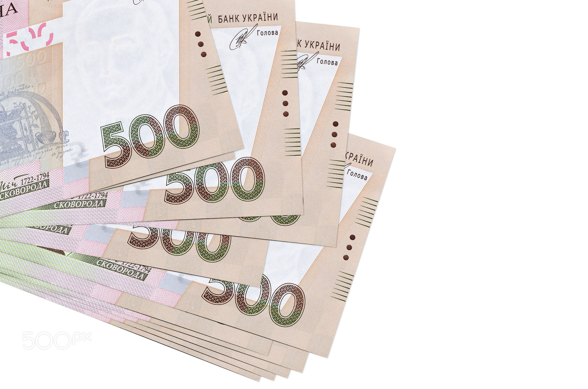 500 Ukrainian hryvnias bills lies in small bunch or pack isolated on white. Mockup with copy space