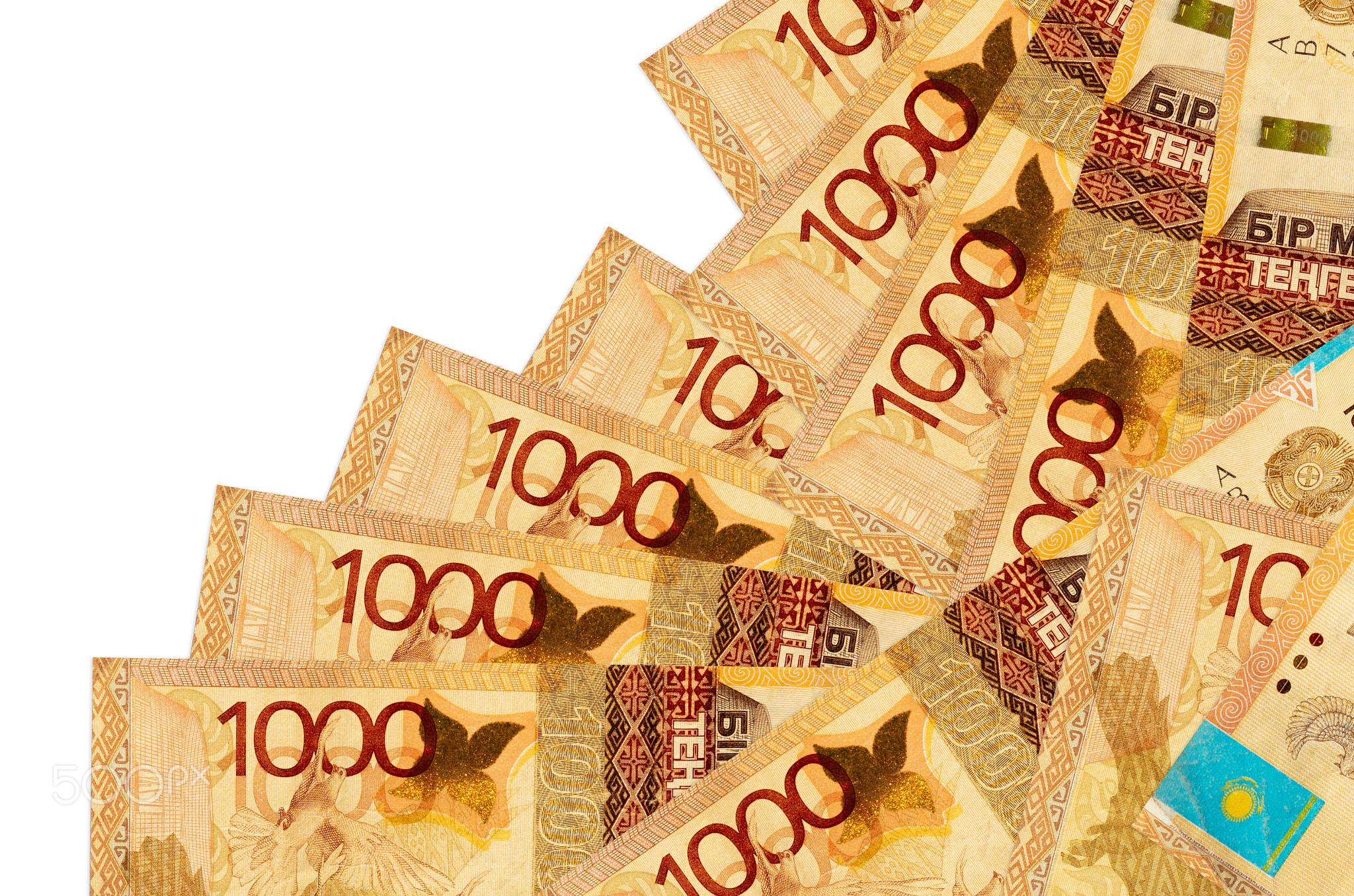 1000 Kazakhstani tenge bills lies in different order isolated on white. Local banking or money