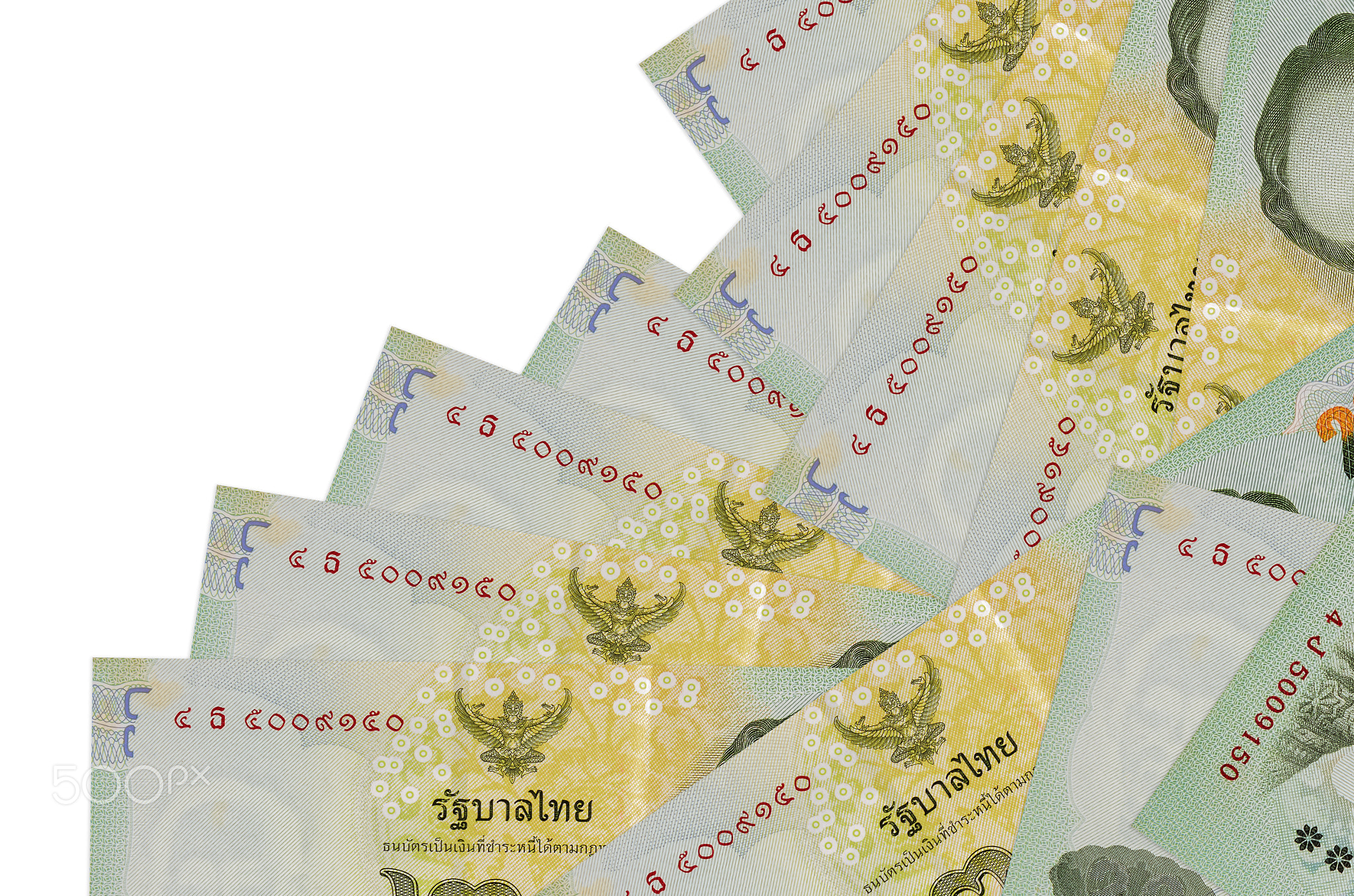 20 Thai Baht bills lies in different order isolated on white. Local banking or money making concept