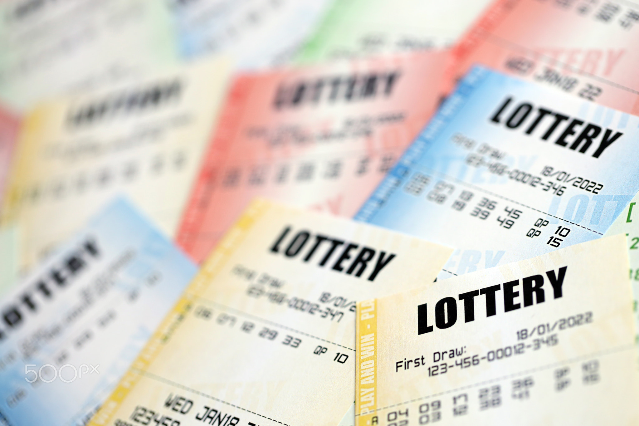 Many lottery tickets on blank bills with numbers for playing lottery