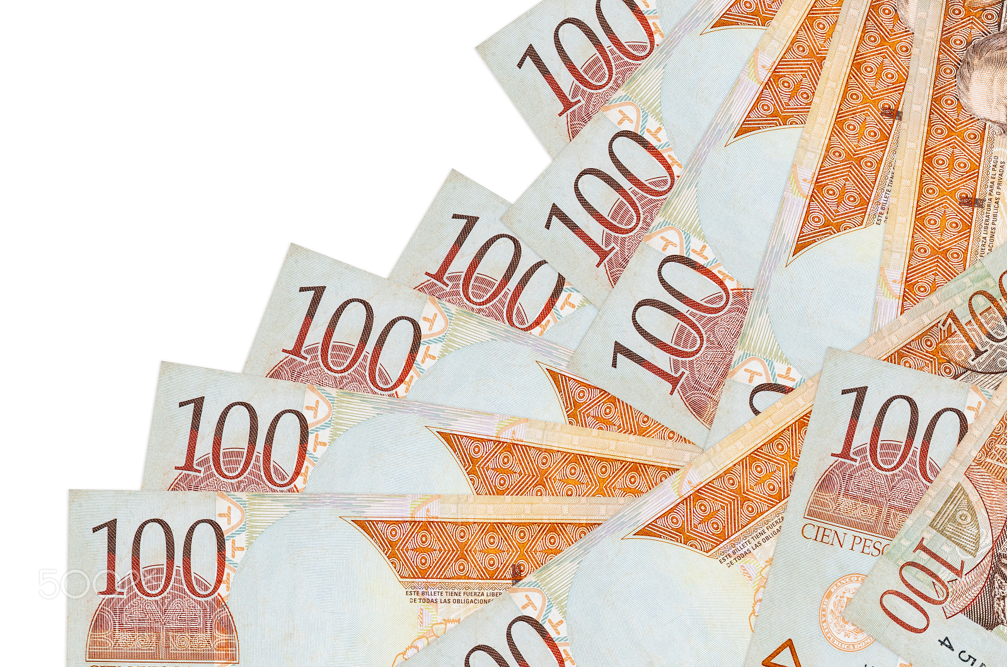 100 Dominican peso bills lies in different order isolated on white. Local banking or money making