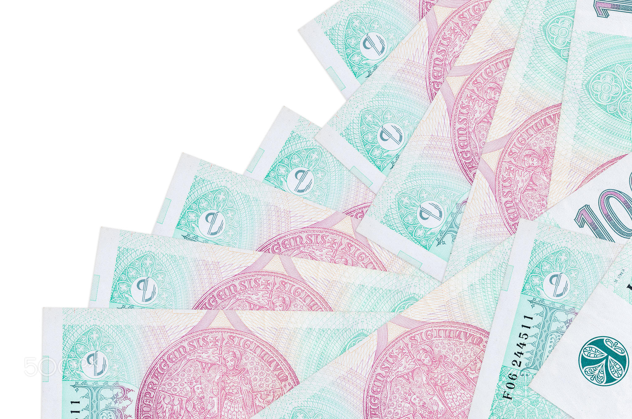 100 Czech korun bills lies in different order isolated on white. Local banking or money making