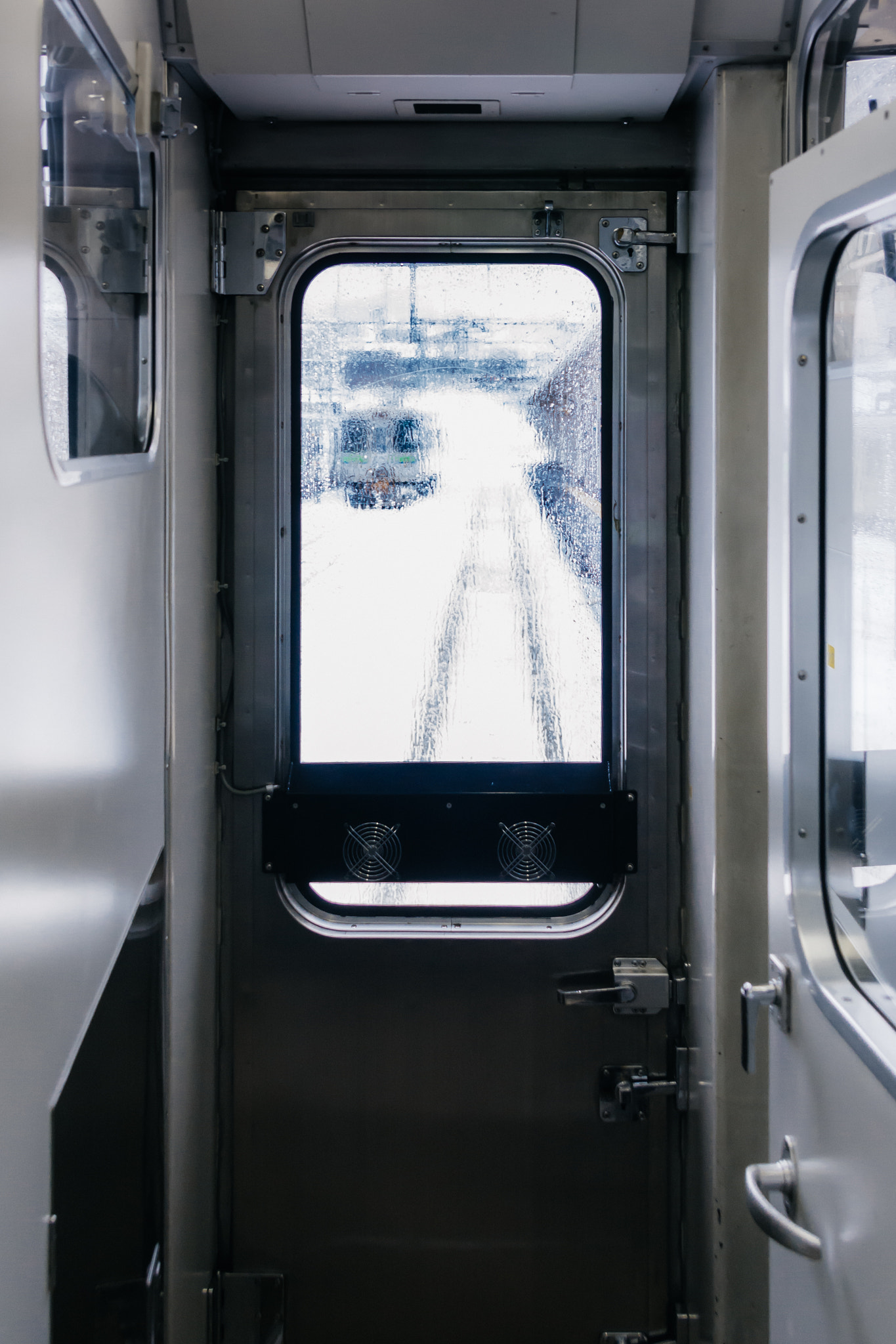 winter behind window of train