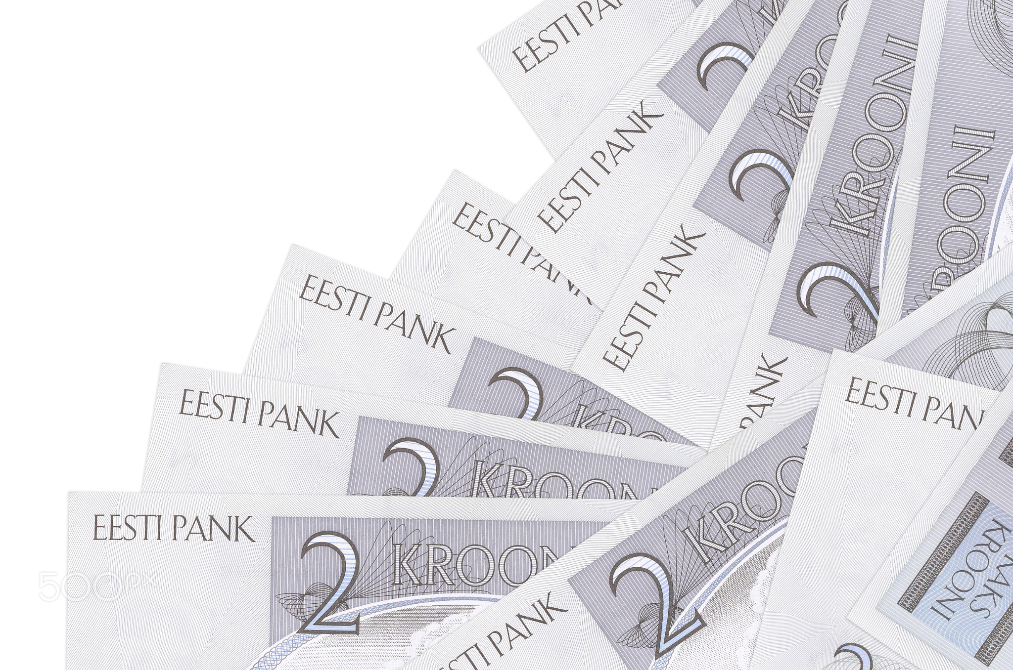 2 Estonian kroon bills lies in different order isolated on white. Local banking or money making