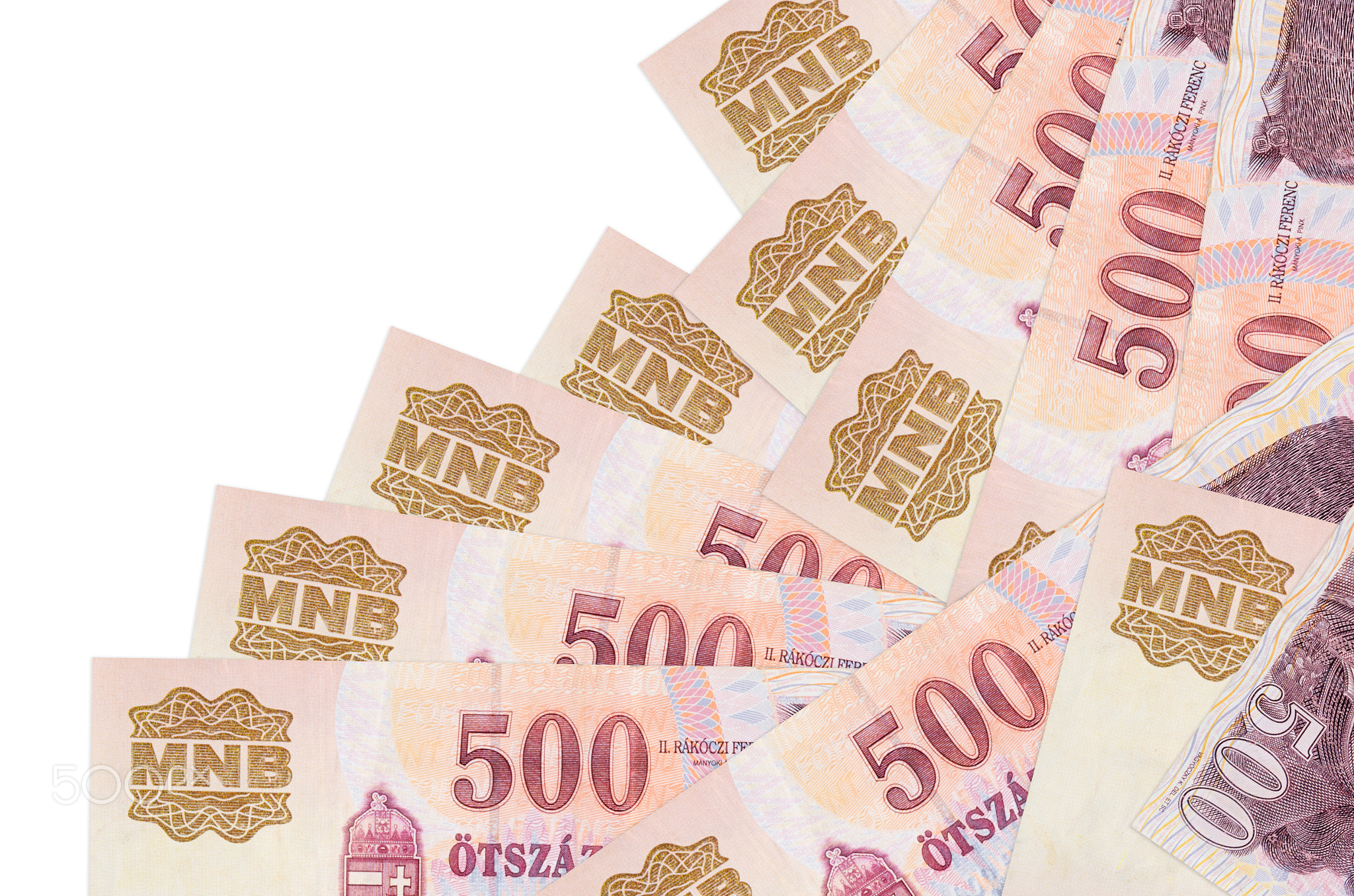 500 Hungarian forint bills lies in different order isolated on white. Local banking or money making