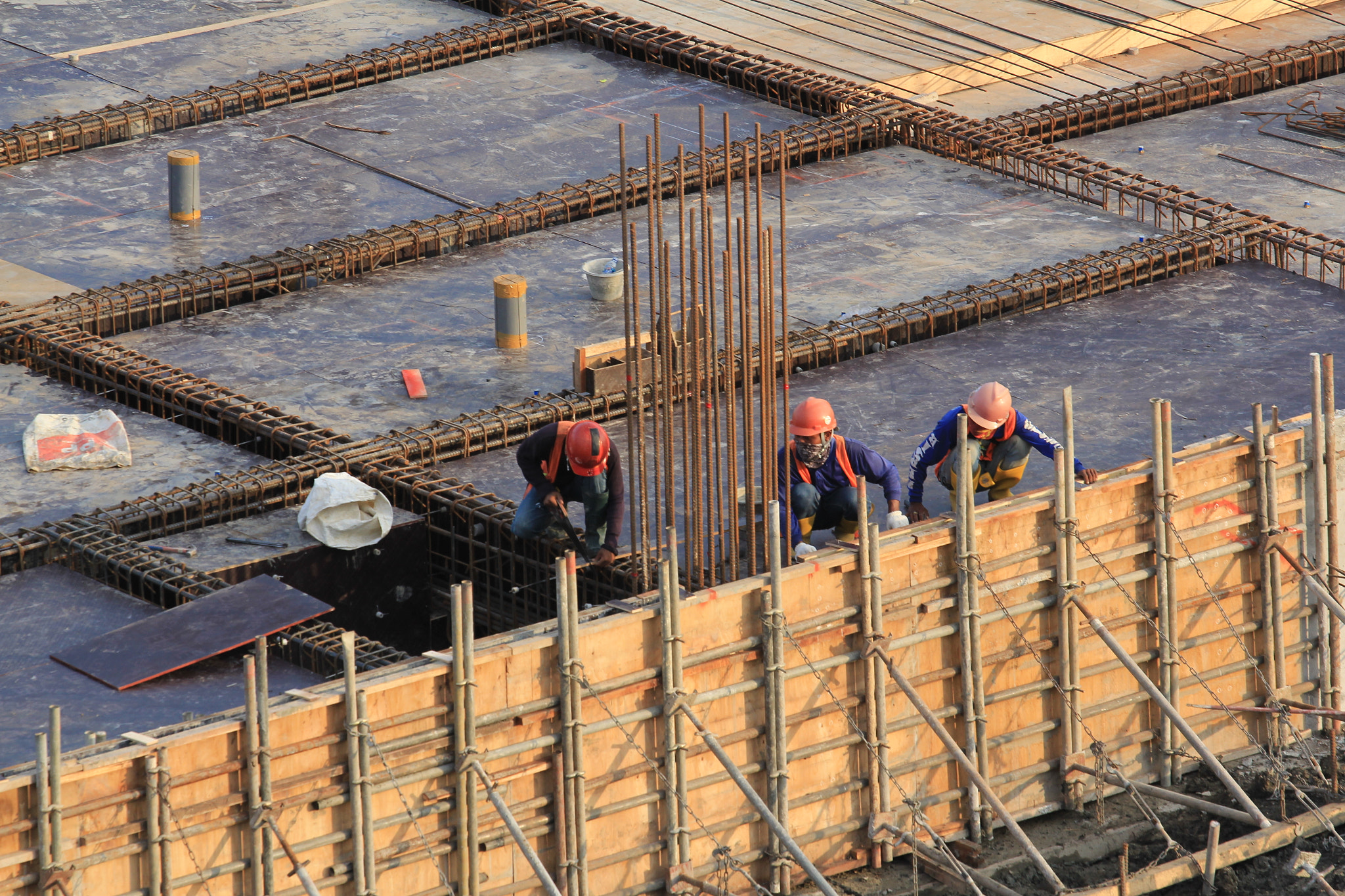 construction workers are constructing the building