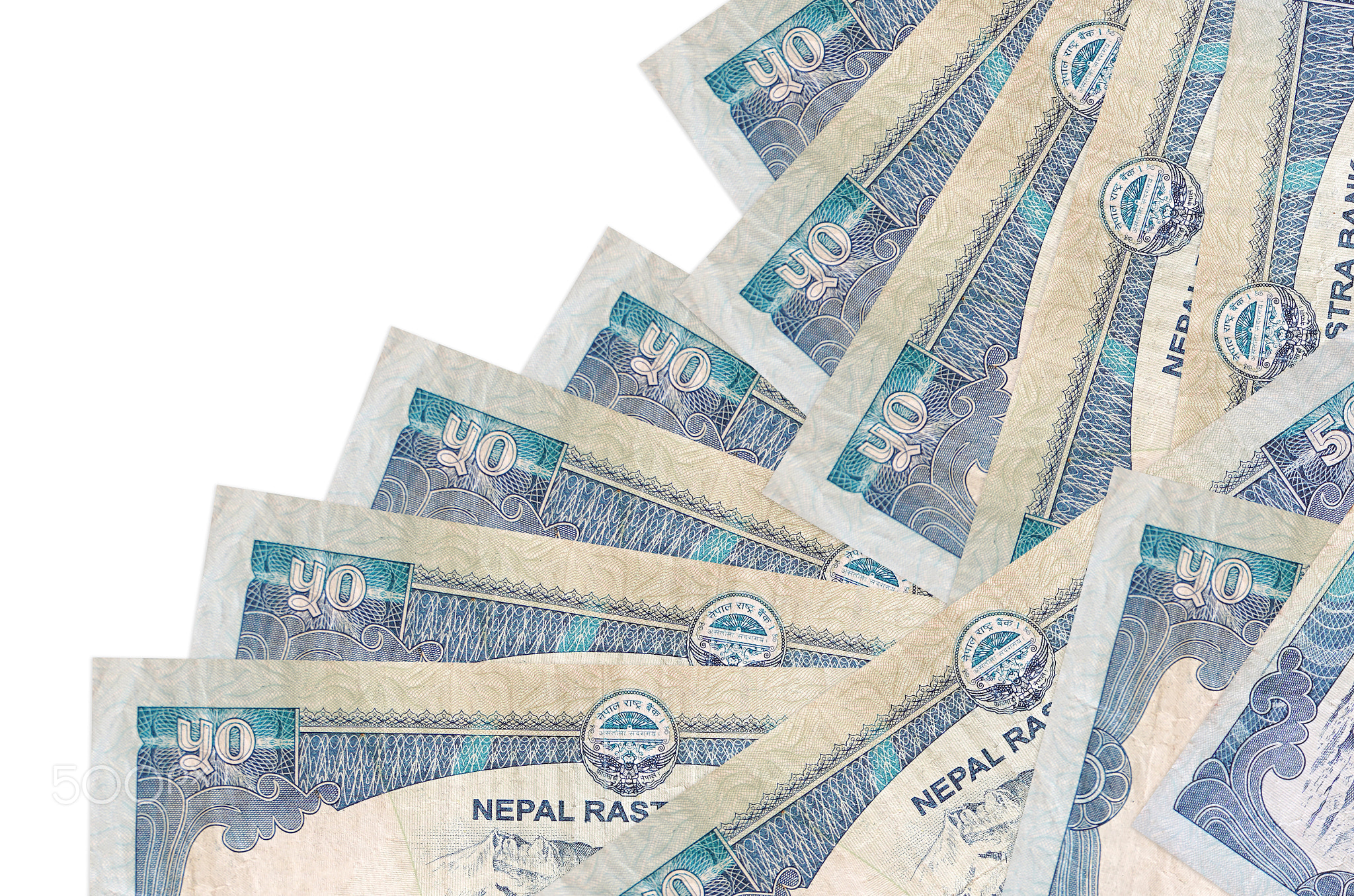 50 Nepalese rupees bills lies in different order isolated on white. Local banking or money making