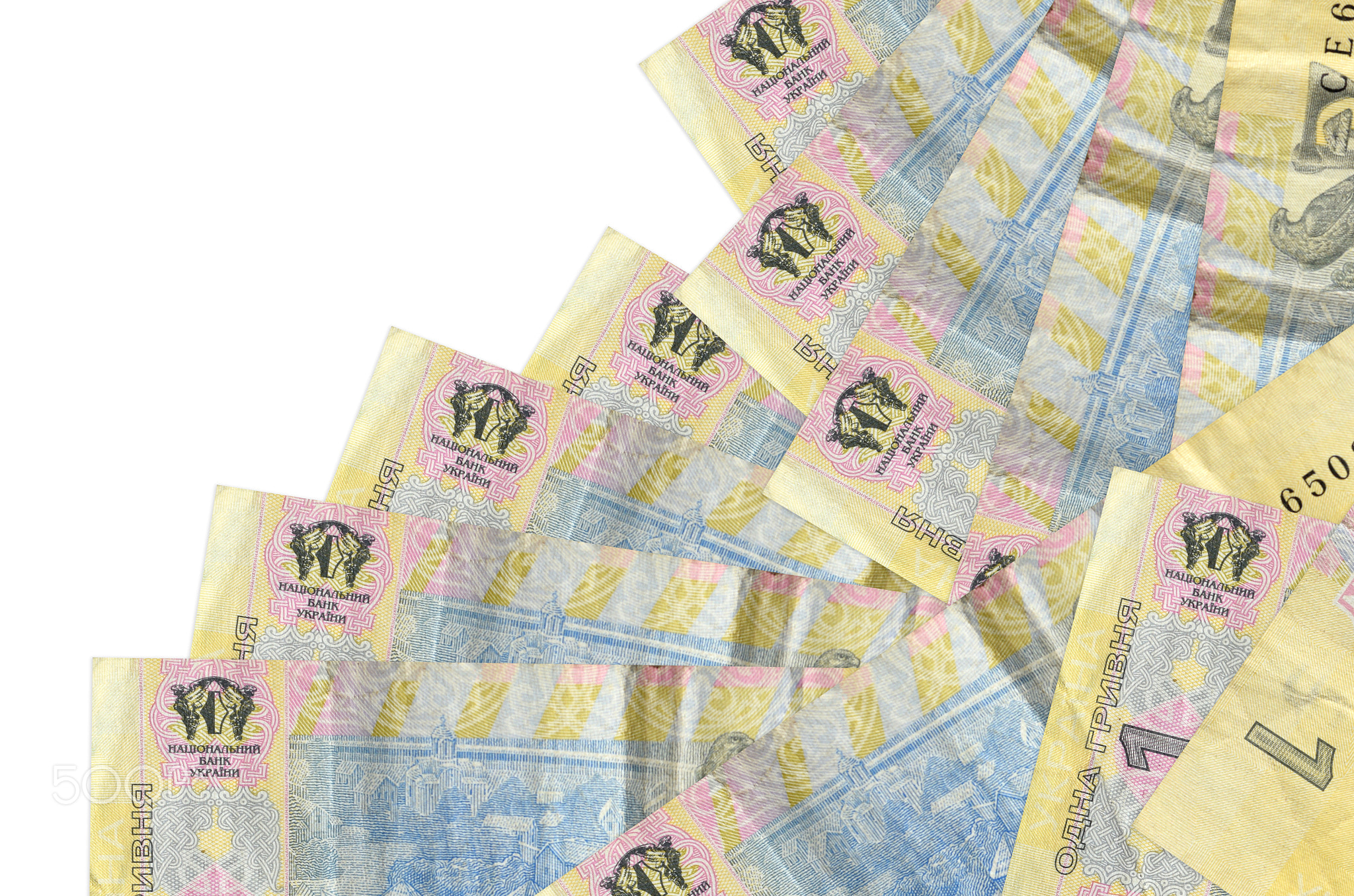 1 Ukrainian hryvnia bills lies in different order isolated on white. Local banking or money making