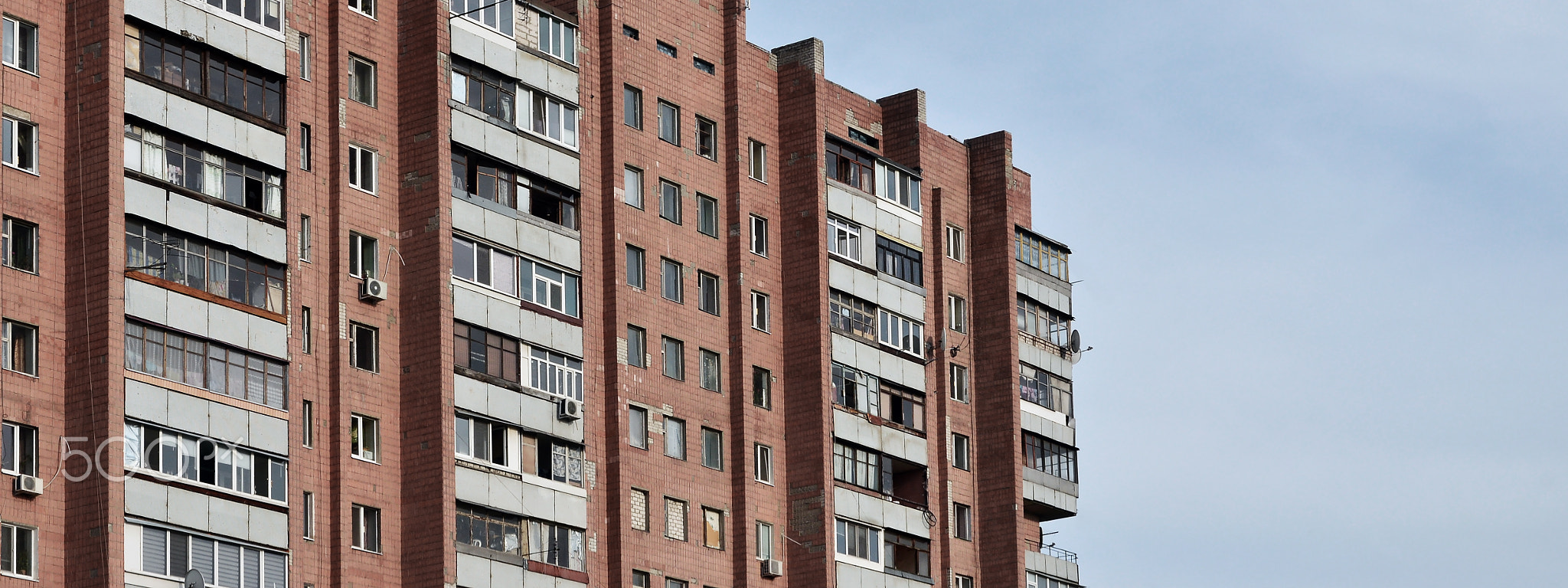 Old multi-storey apartment house in a poorly-developed region of Ukraine or Russia