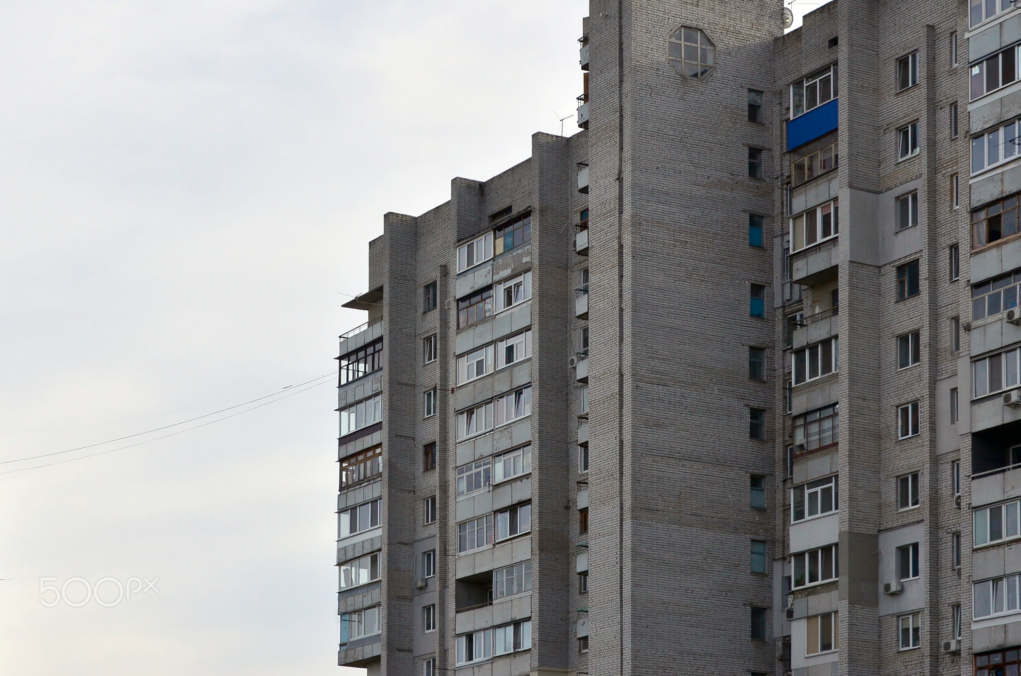 Old multi-storey apartment house in a poorly-developed region of Ukraine or Russia