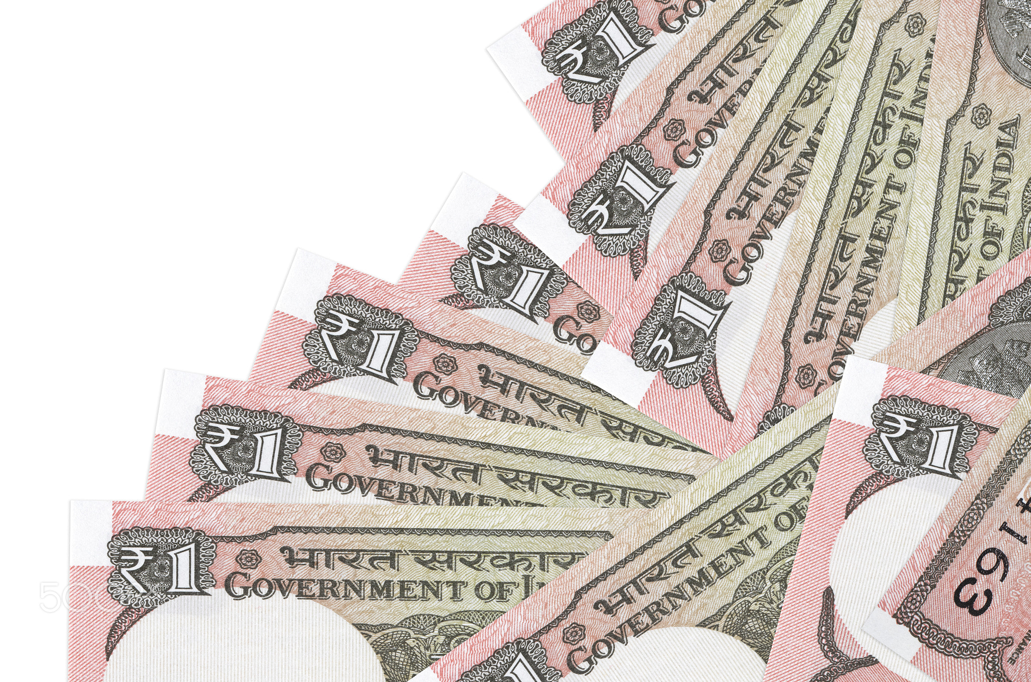 1 Indian rupee bills lies in different order isolated on white. Local banking or money making
