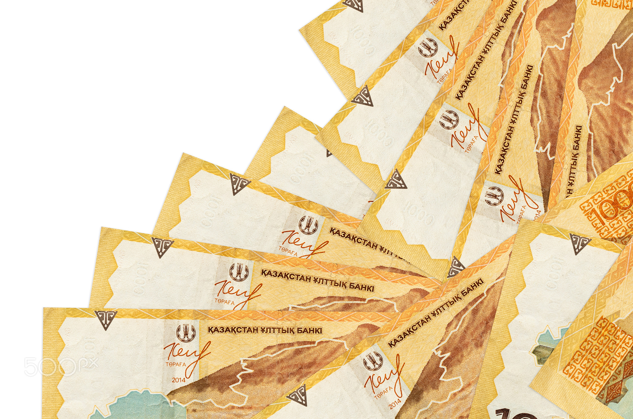 1000 Kazakhstani tenge bills lies in different order isolated on white. Local banking or money