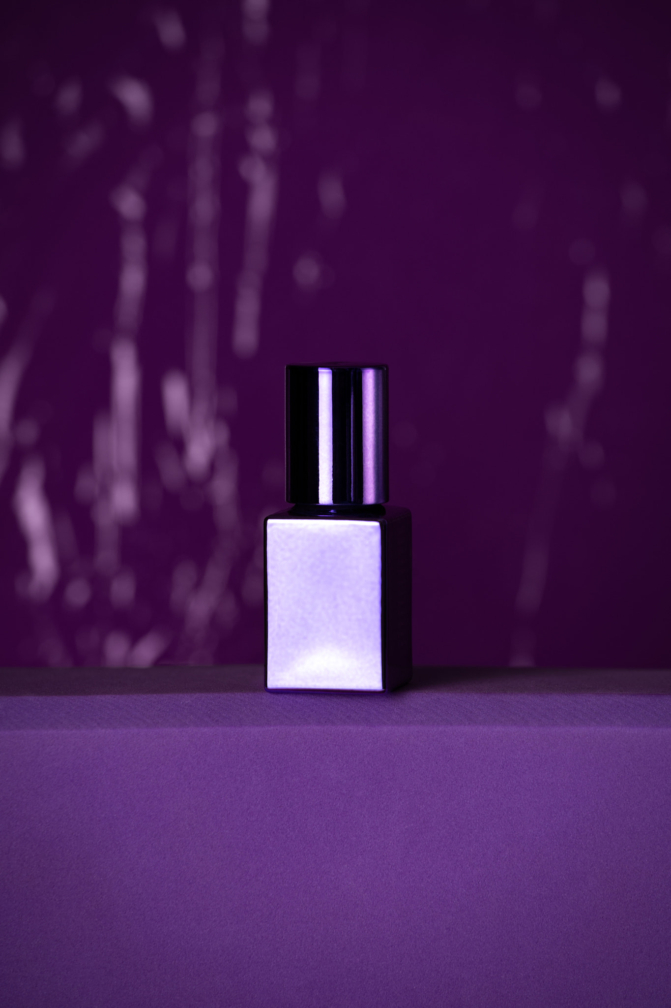 Purple violet chrome nail polish bottle