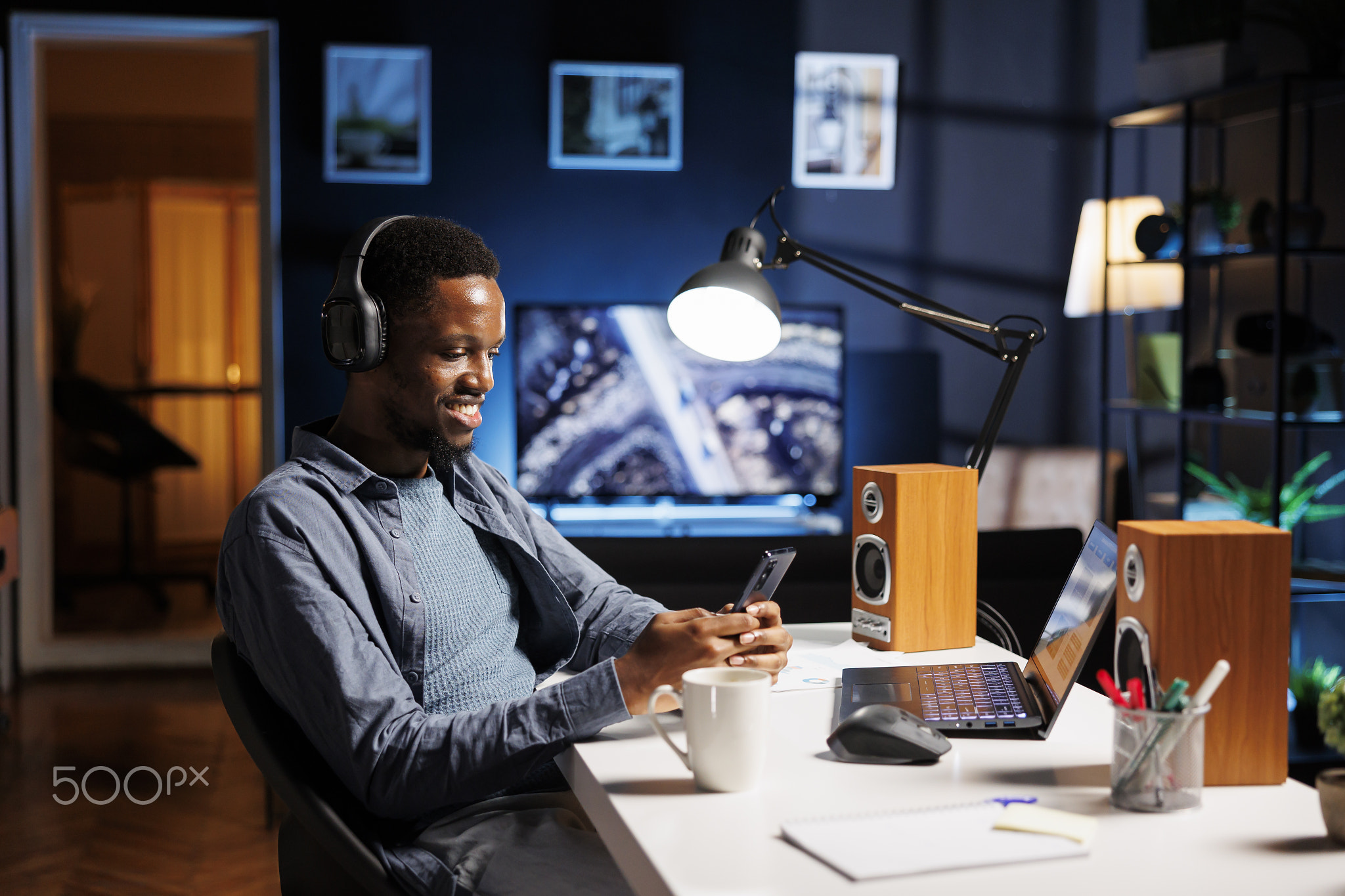 African american guy messaging on smartphone app