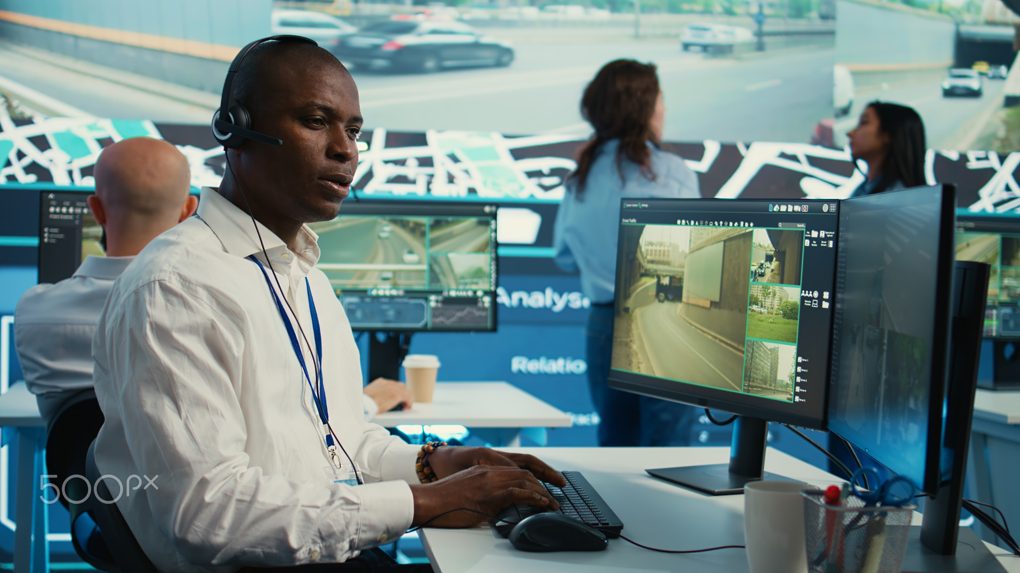 African american dispatch operator gives directions and gps