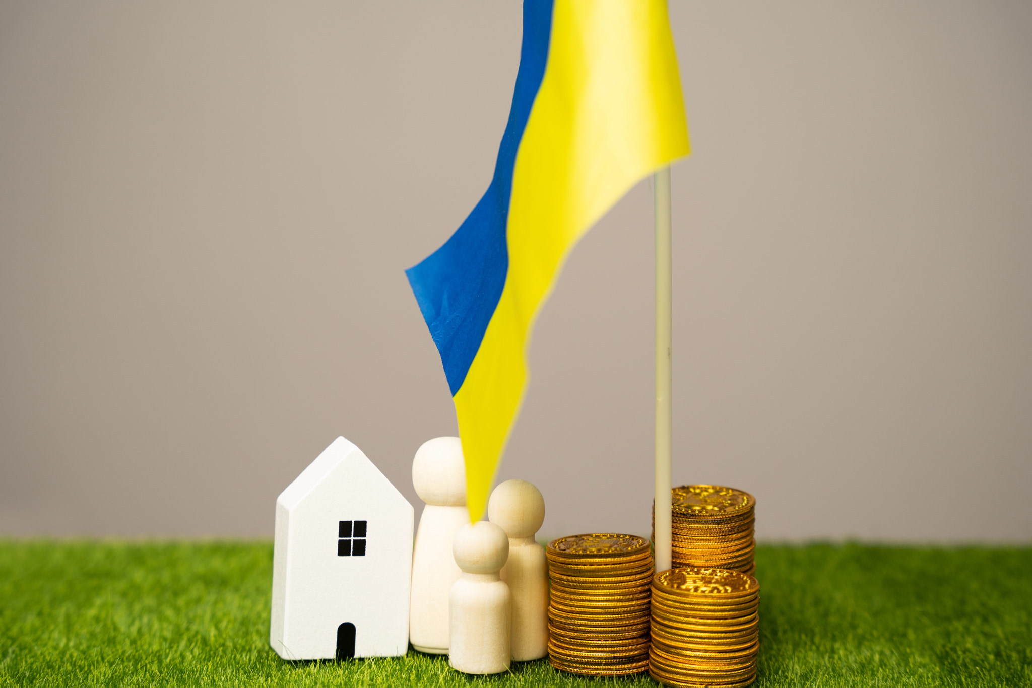 The concept of helping Ukrainian residents affected by the war. Financial support and donation. A fa