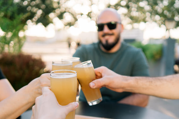 Friends toasting beer glasses by Olha Dobosh on 500px.com