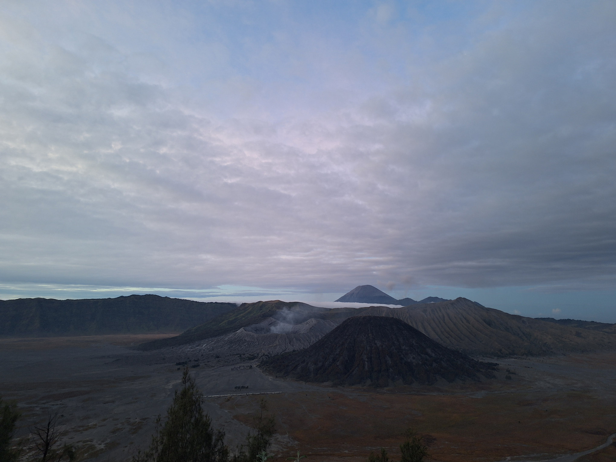 Scenic view of volcanic landscape against sky